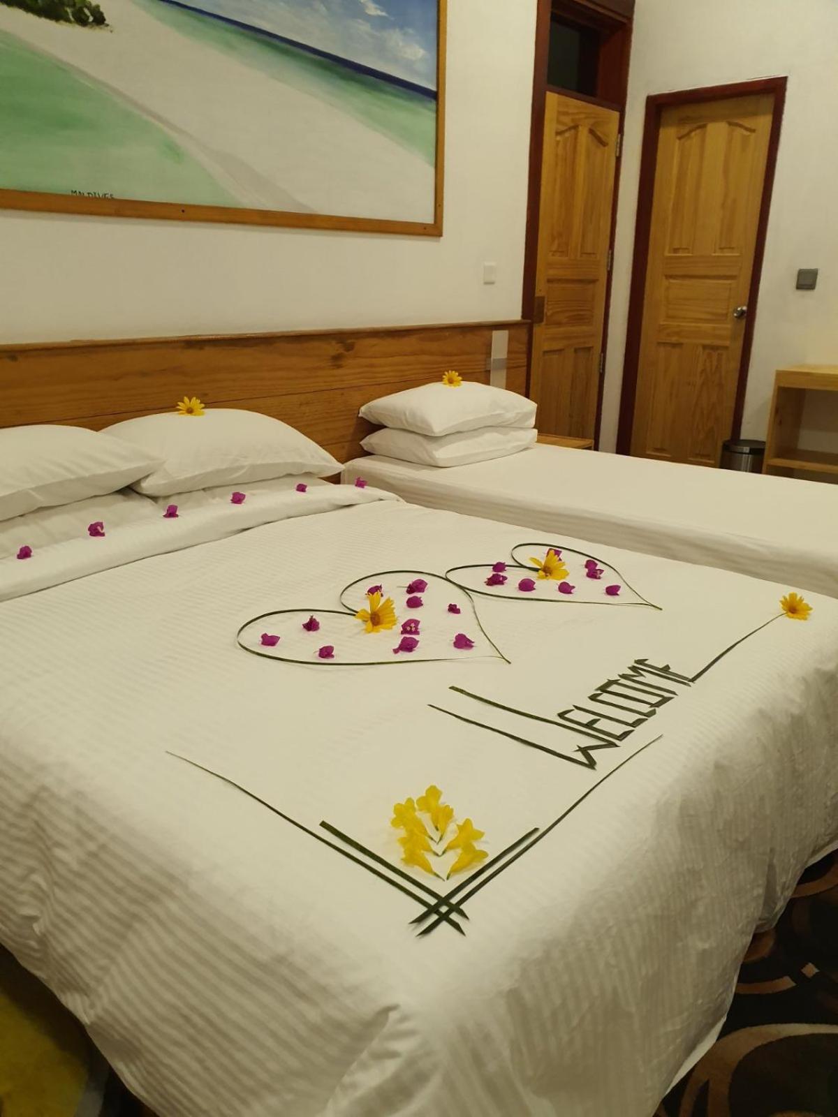 Deluxe Double Room (2 Adults + 1 Child) photo 2
