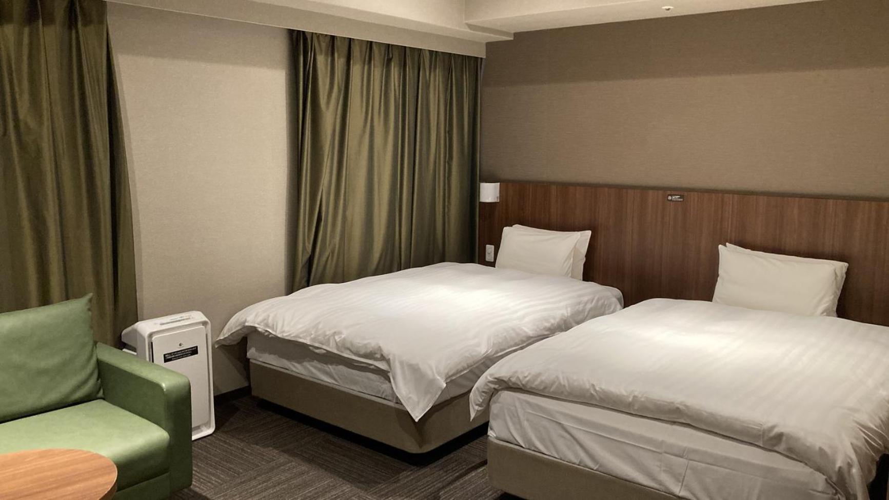 Universal Twin Room - Non-Smoking - Photo 1