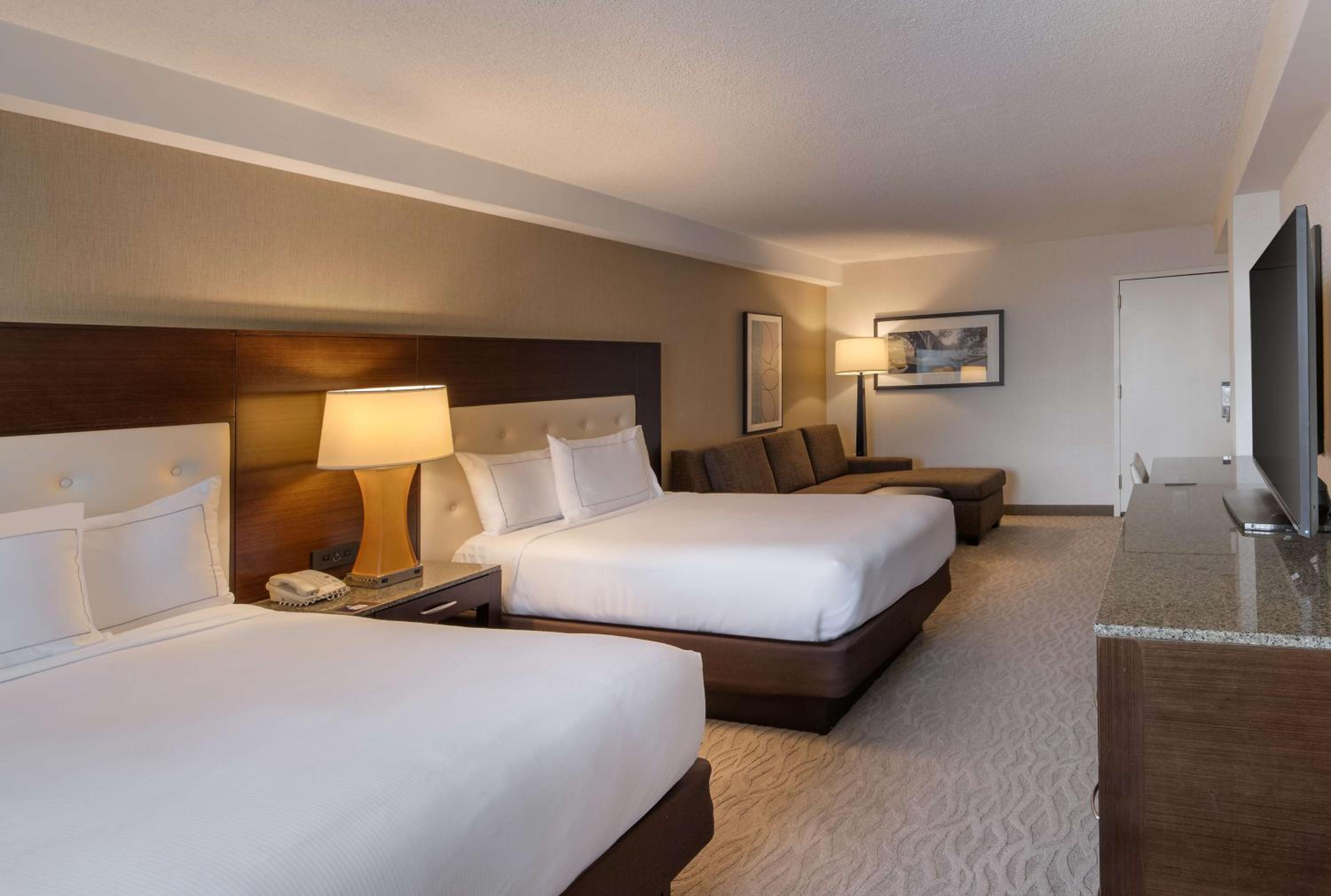 Large Room with Two Full Beds, Sofa Bed and View - Photo 1