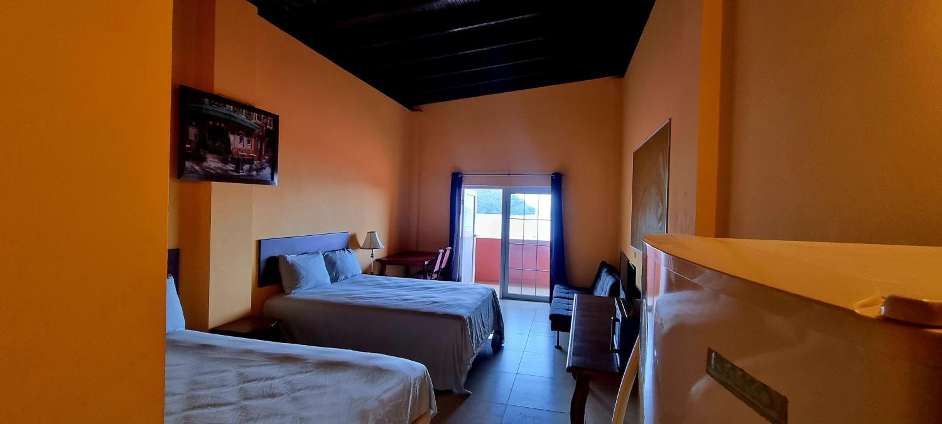Deluxe Queen Room with Two Queen Beds photo 2