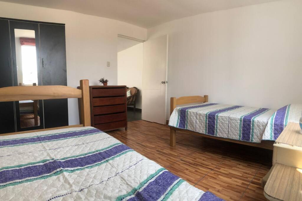 Three-Bedroom Apartment photo 1