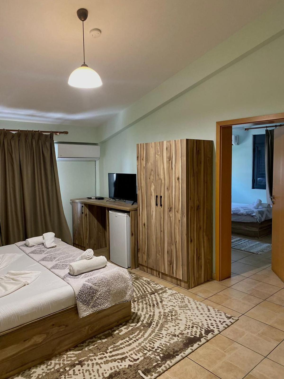 Deluxe Family Suite with Balcony and Side Sea View