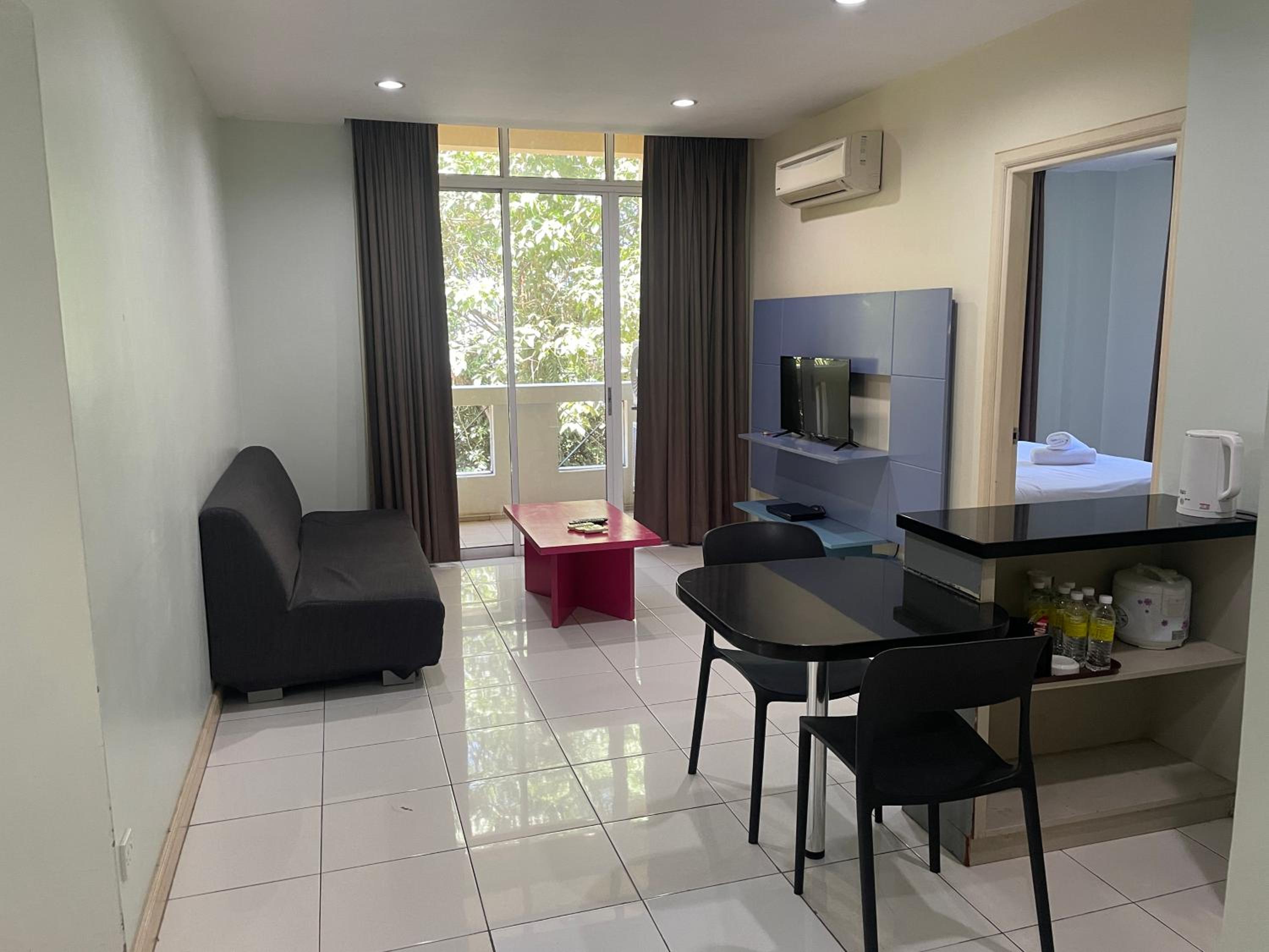 Three-Bedroom Apartment - Photo 2