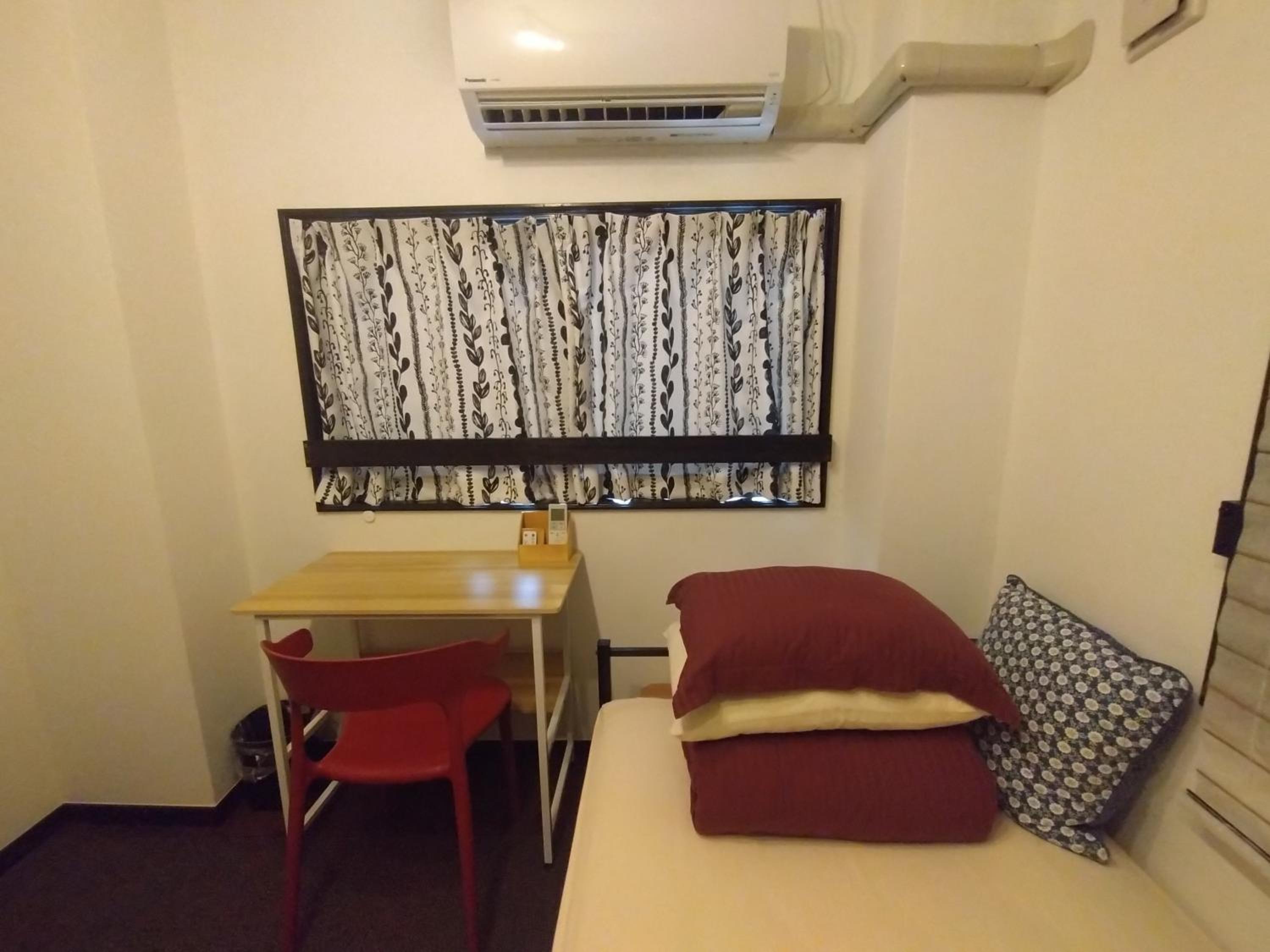 Single Room With Shared Shower And Toilet