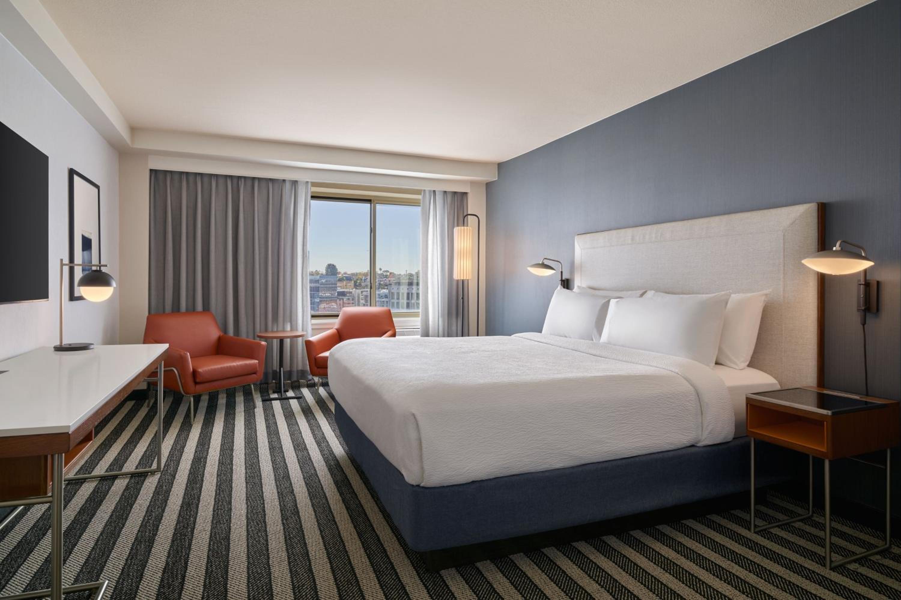 One-Bedroom King Suite with High Floor, Roll-In Shower and Sofa Bed - Mobility Access/Hearing Accessible photo 2