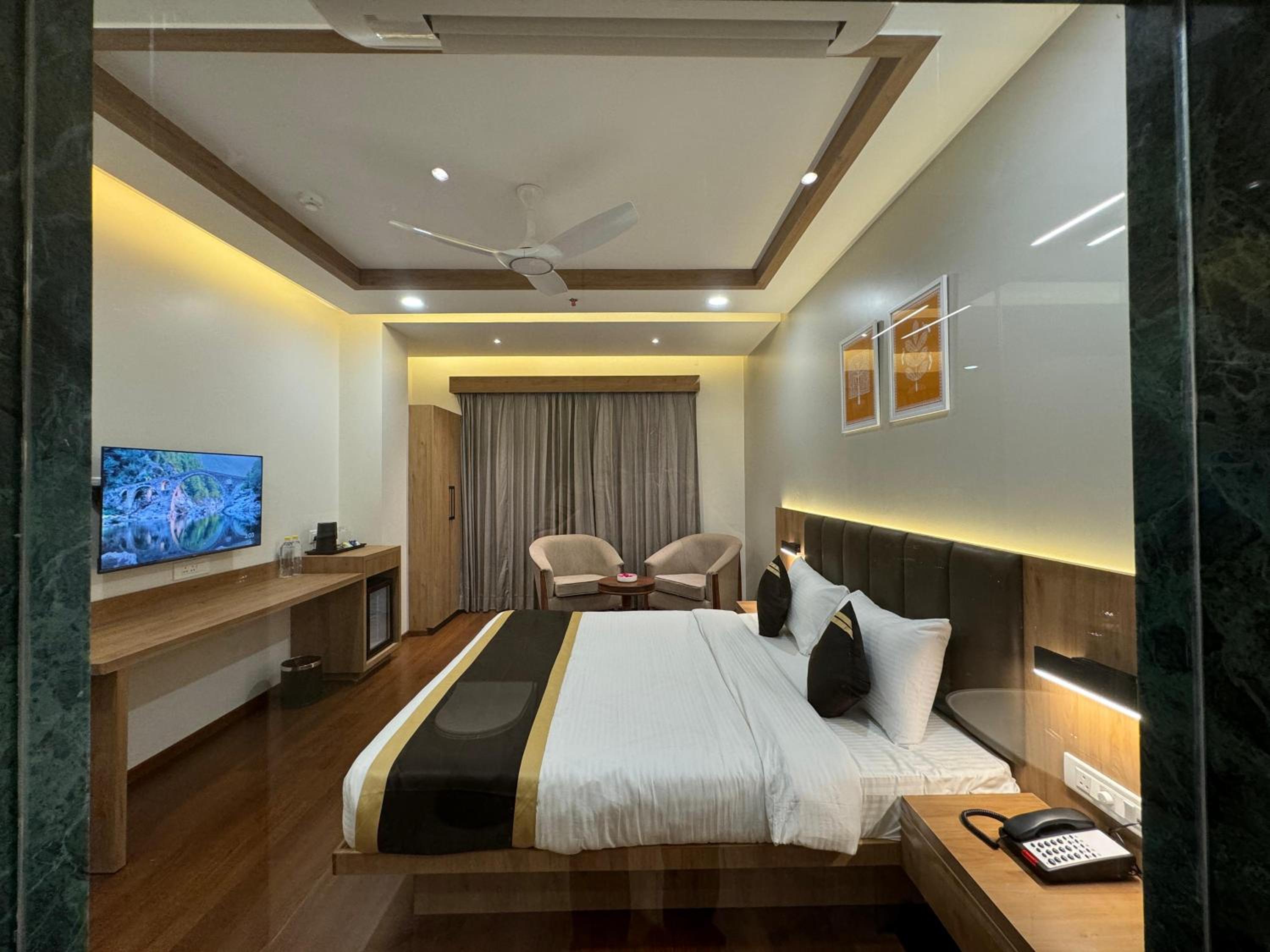 Deluxe Room - Photo 1