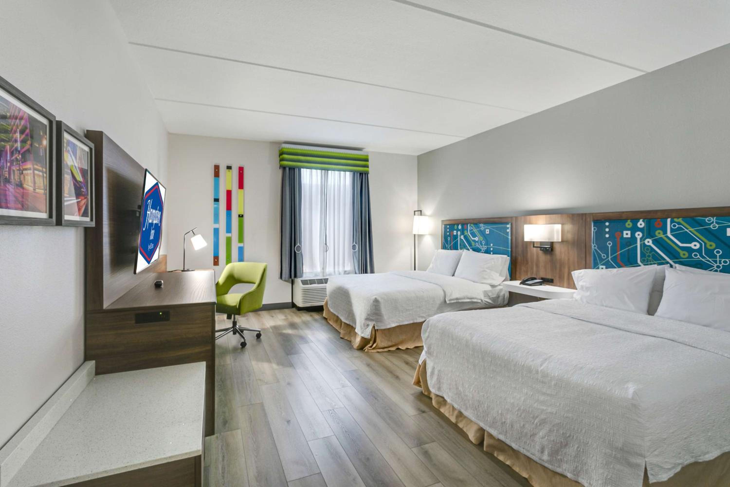 Queen Room with Two Queen Beds and Bath Tub - Photo 4
