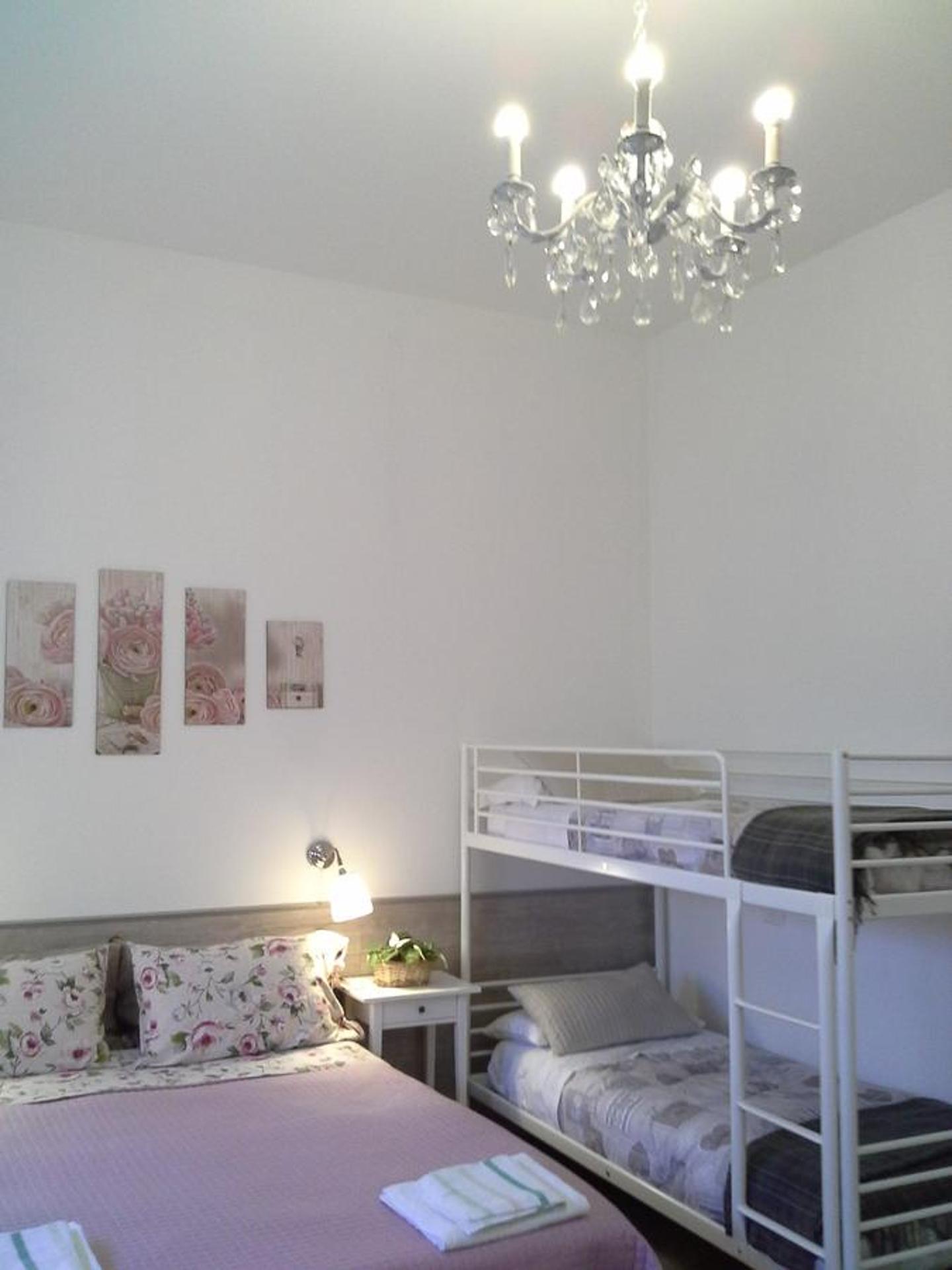 Quadruple Room with Private Bathroom - Photo 1