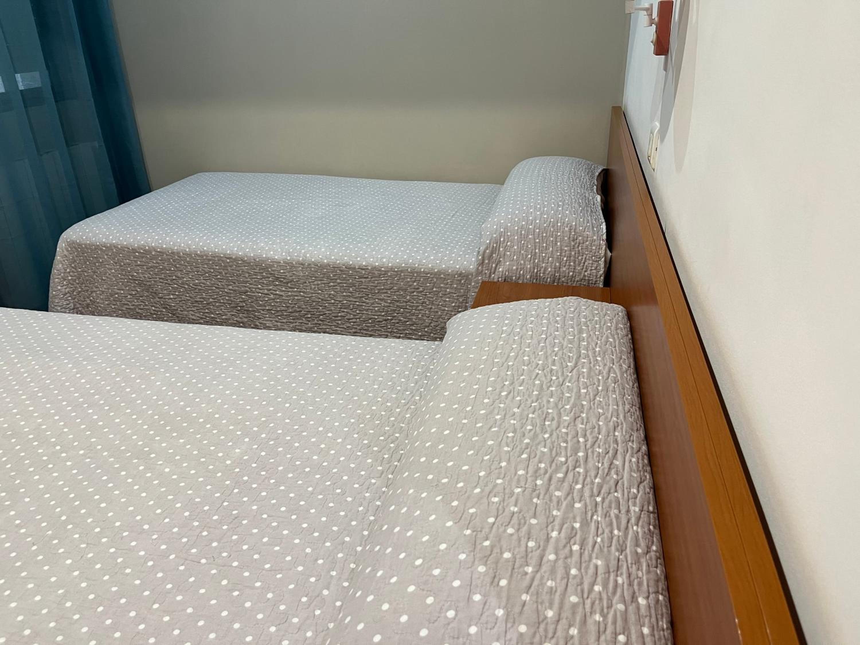 Habitación Estándar con Dos Camas y Baño Compartido