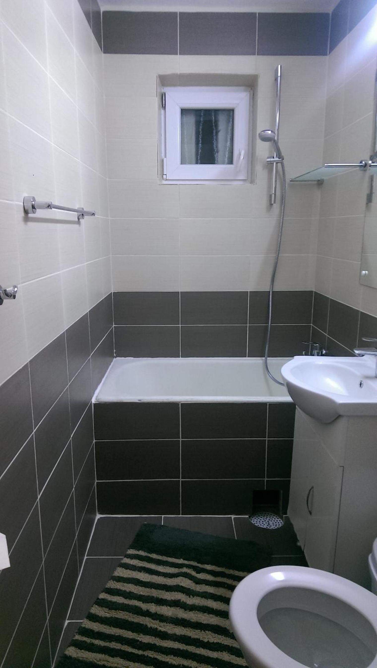 Two-Bedroom Apartment - Photo 11