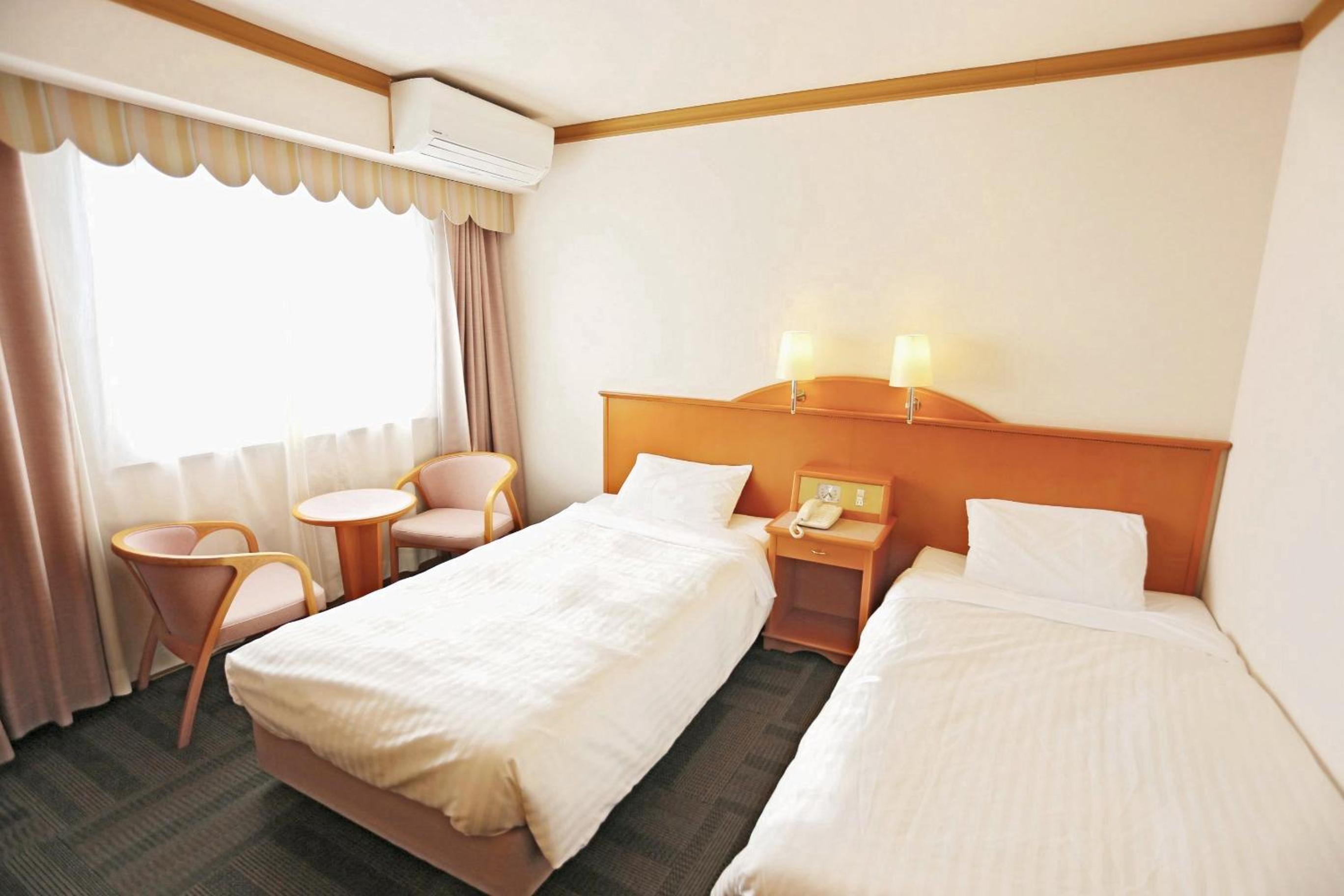 Twin Room  - Non-Smoking - Photo 5