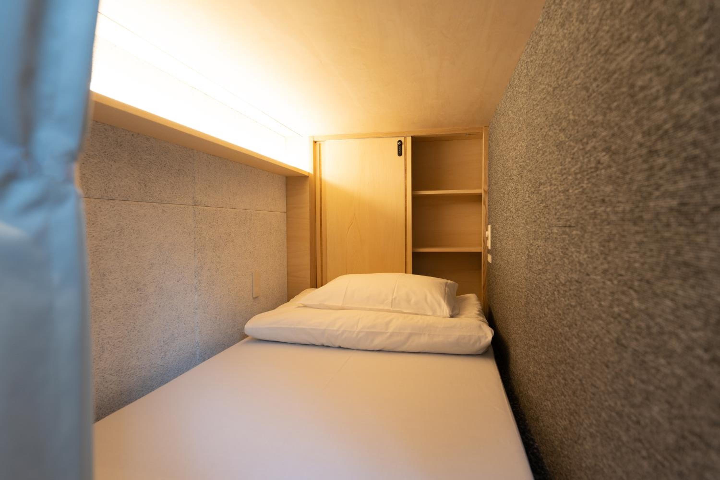 Single Bed In Female Dormitory Room photo 1