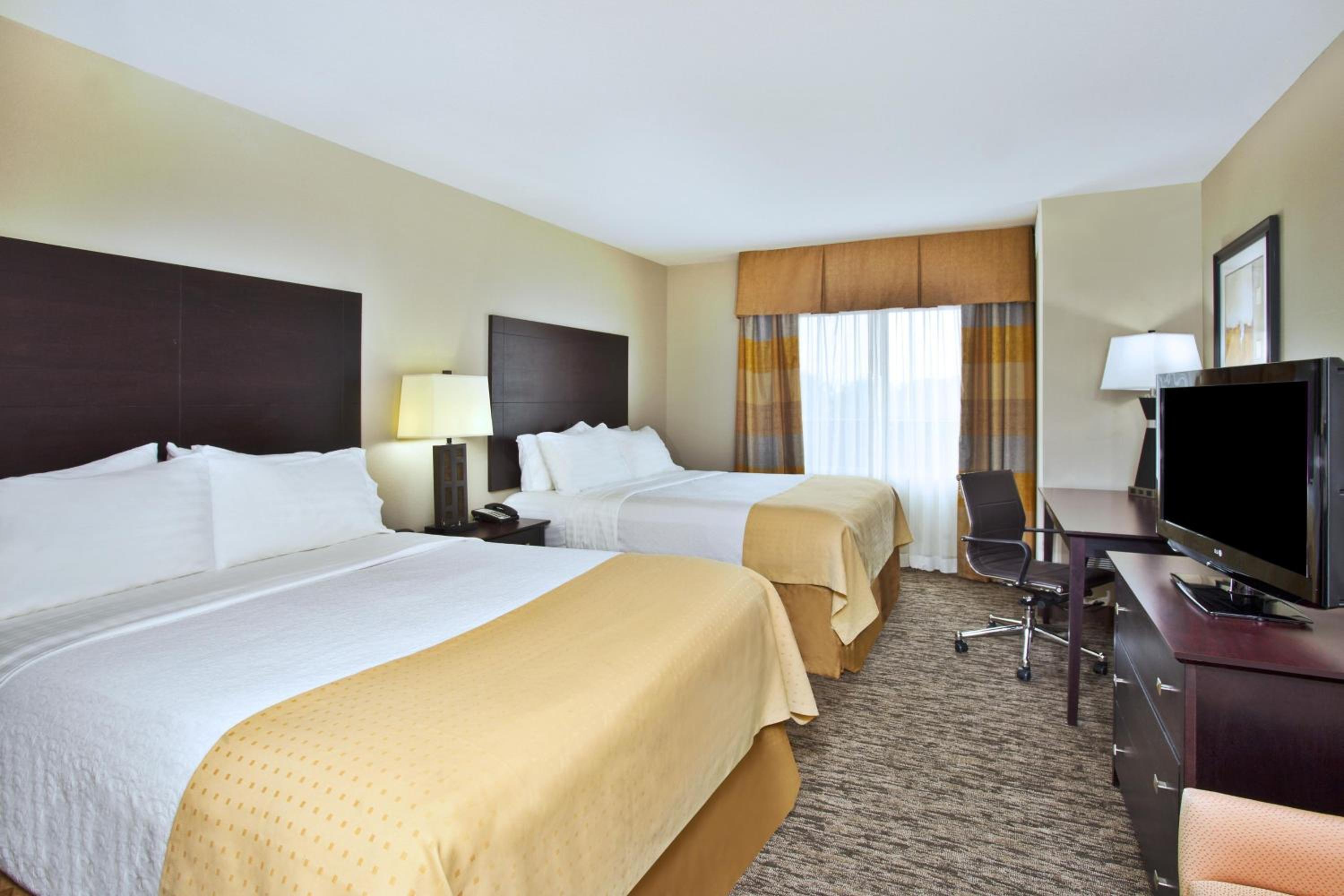 Standard Queen Room with Two Queen Beds - Photo 1