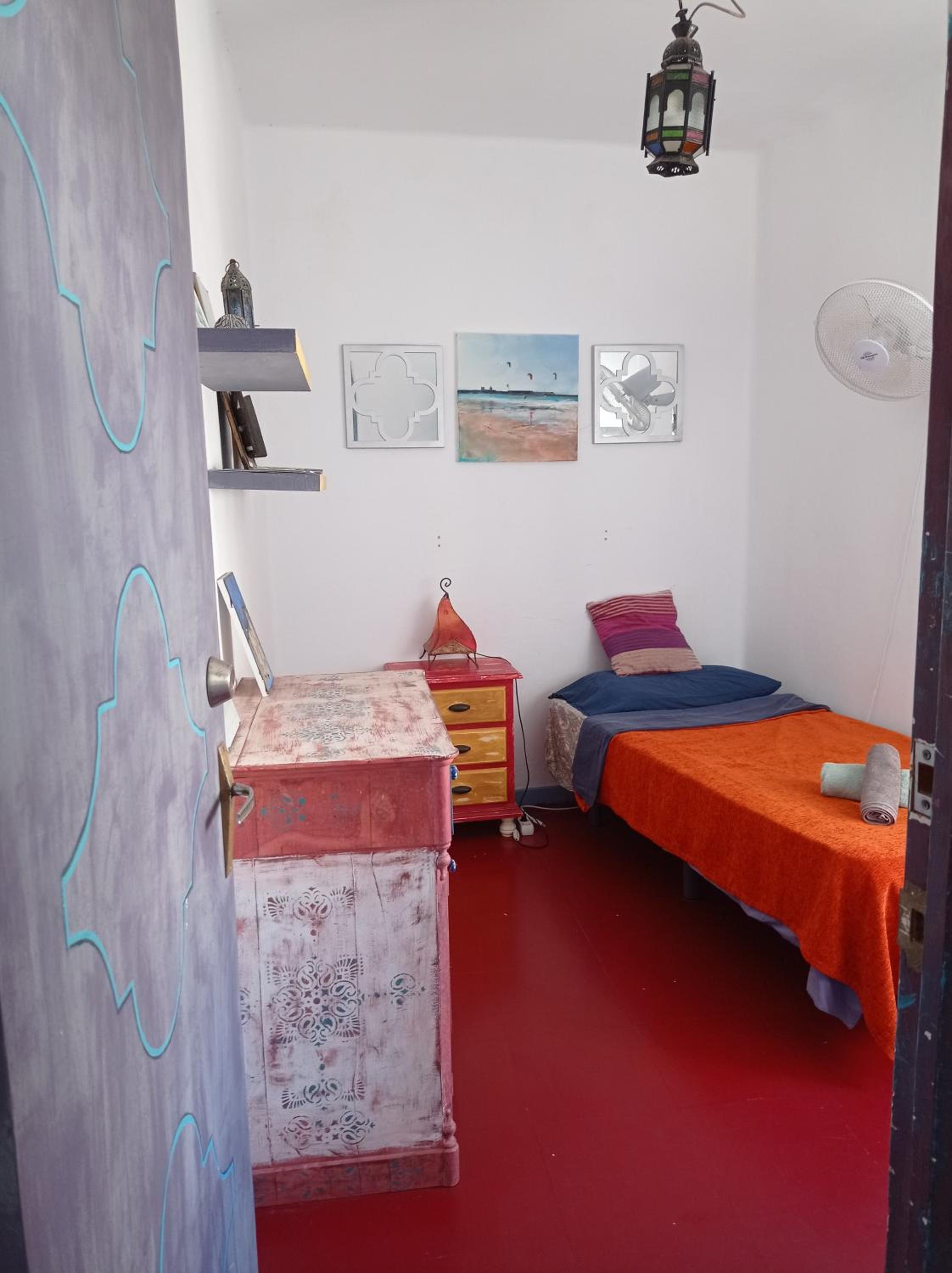 Habitación individual con baño compartido