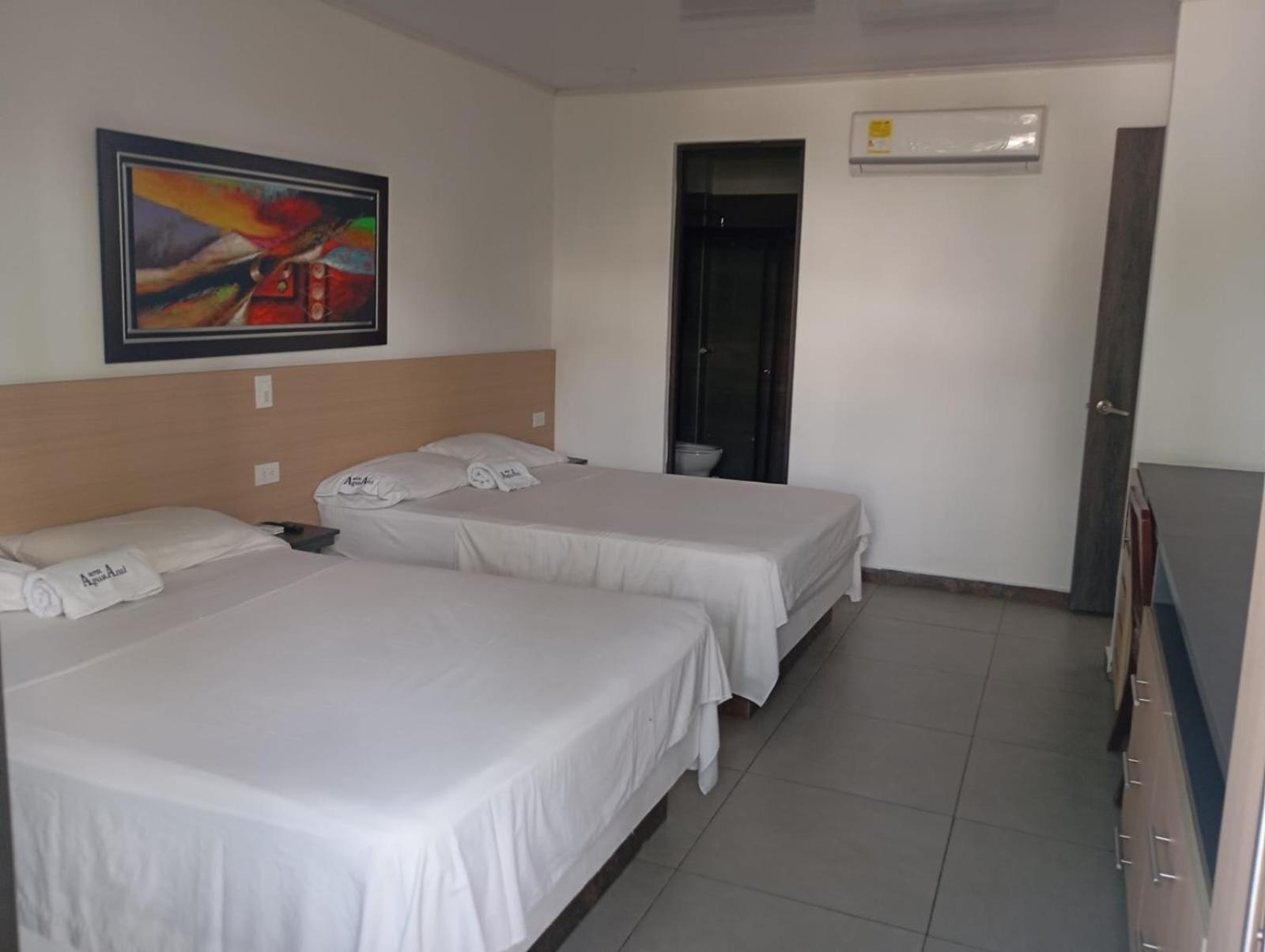 Deluxe Queen Room With Two Queen Beds photo 1