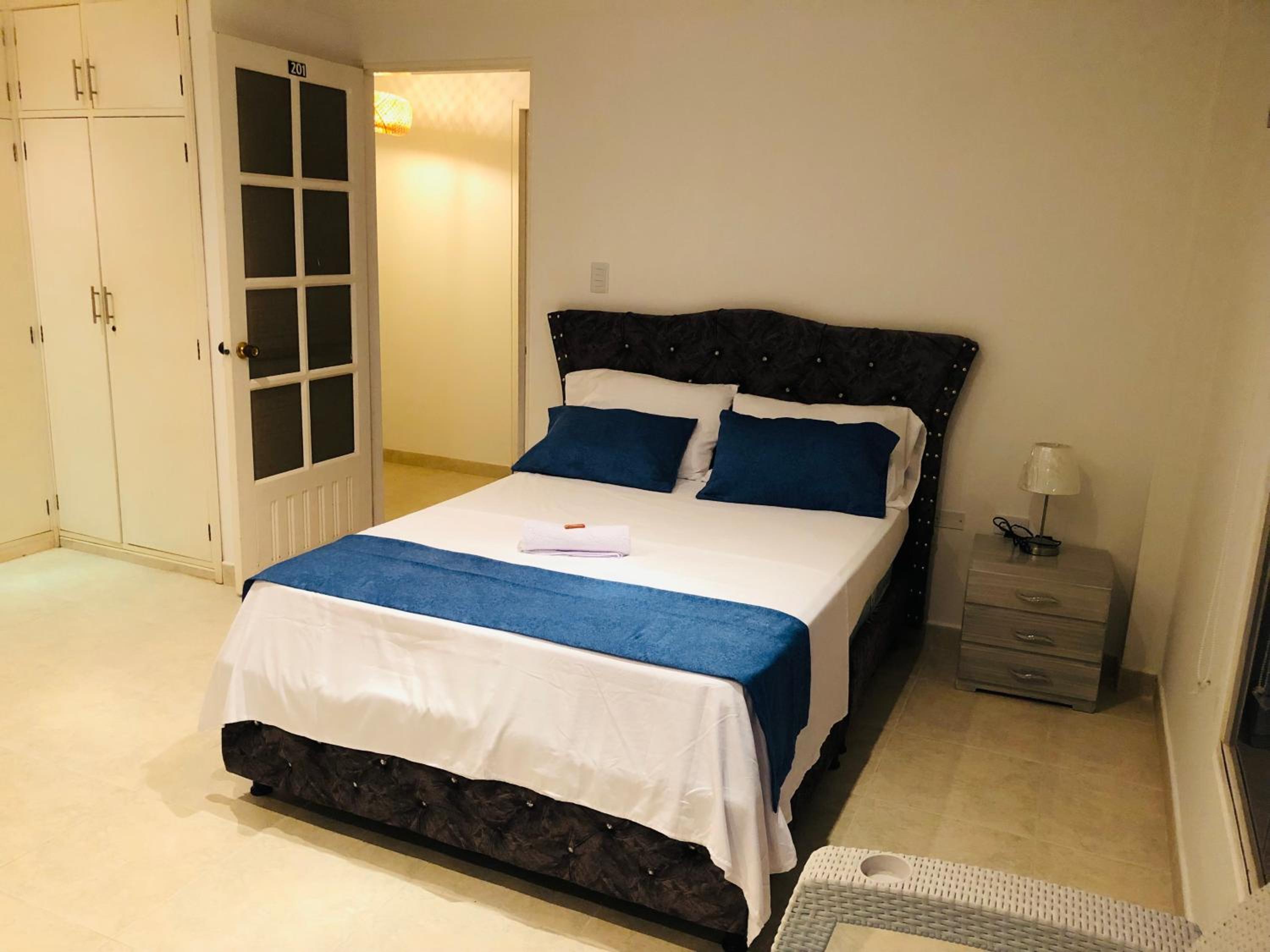 Deluxe Queen Room With Two Queen Beds photo 1