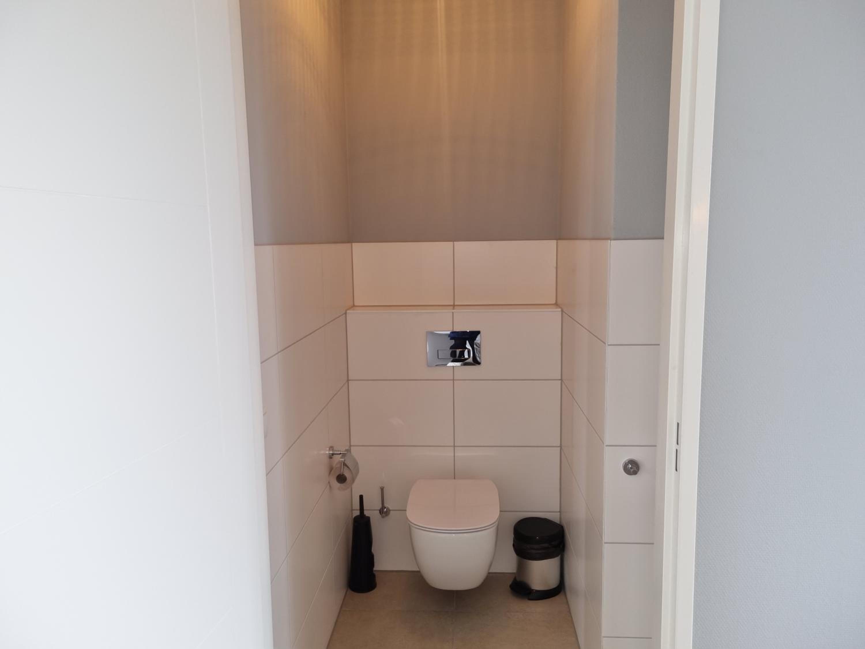 Three-Bedroom Apartment - Photo 11