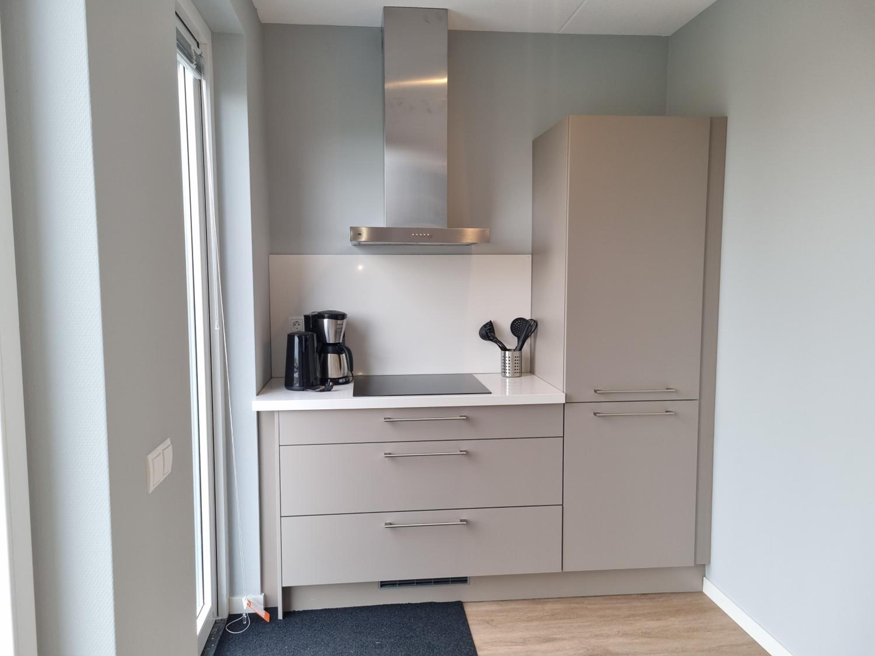 Three-Bedroom Apartment - Photo 21