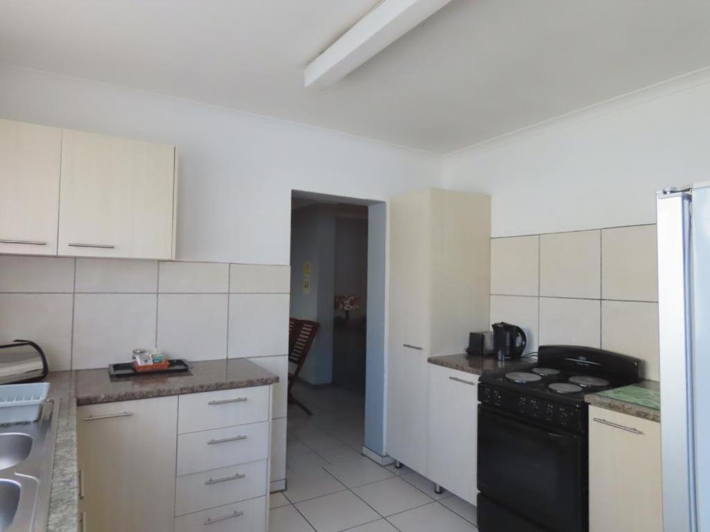 Three-Bedroom House - Photo 4
