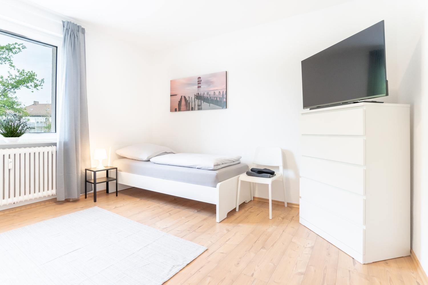 Three-Bedroom Apartment photo 1