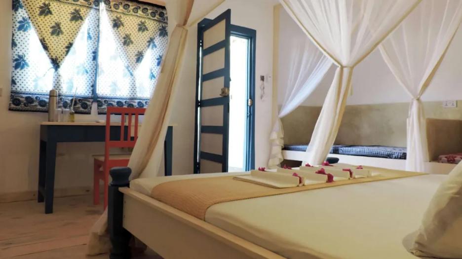 Quadruple Room with Private Bathroom