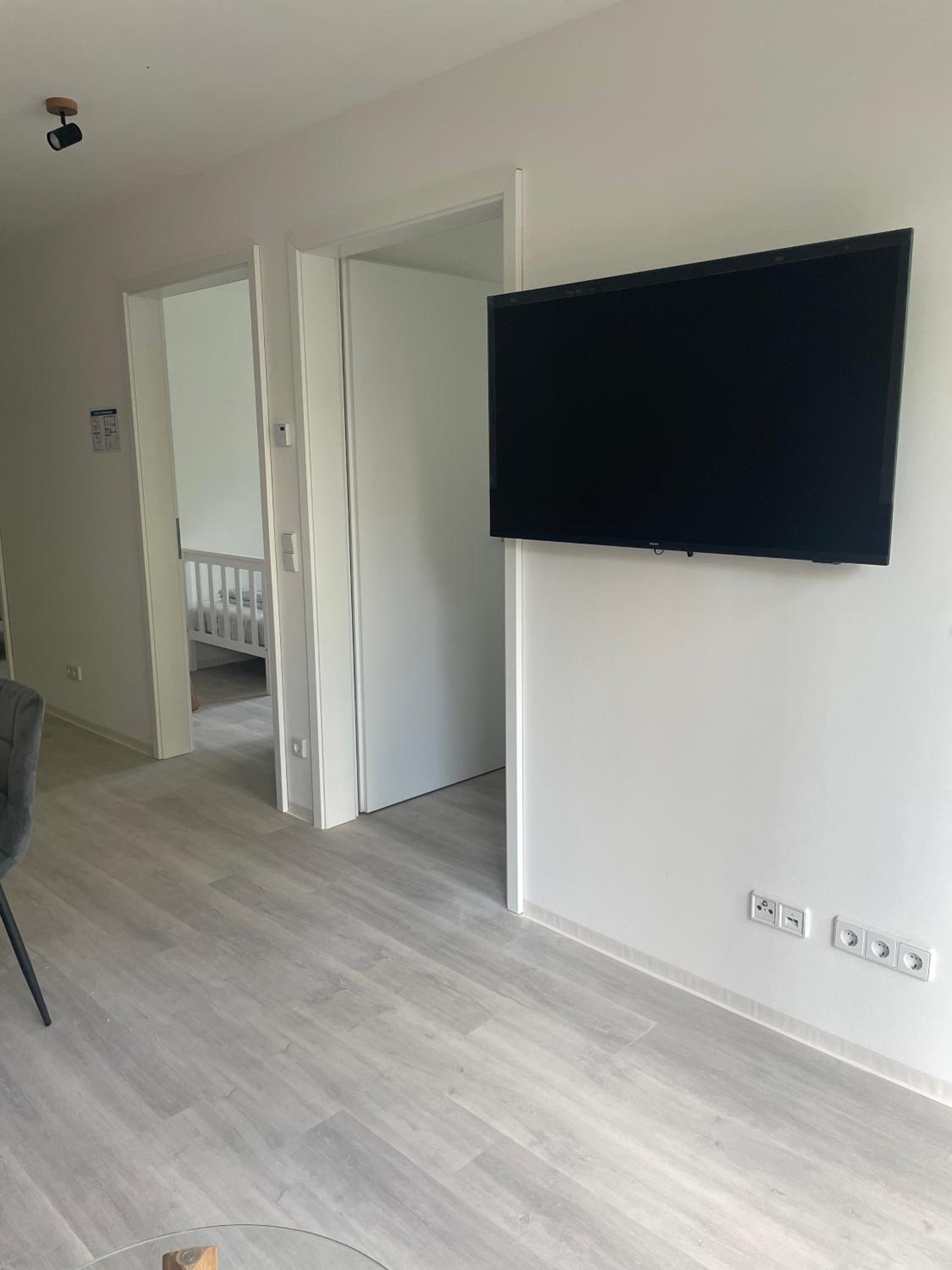 Three-Bedroom Apartment with Balcony photo 1