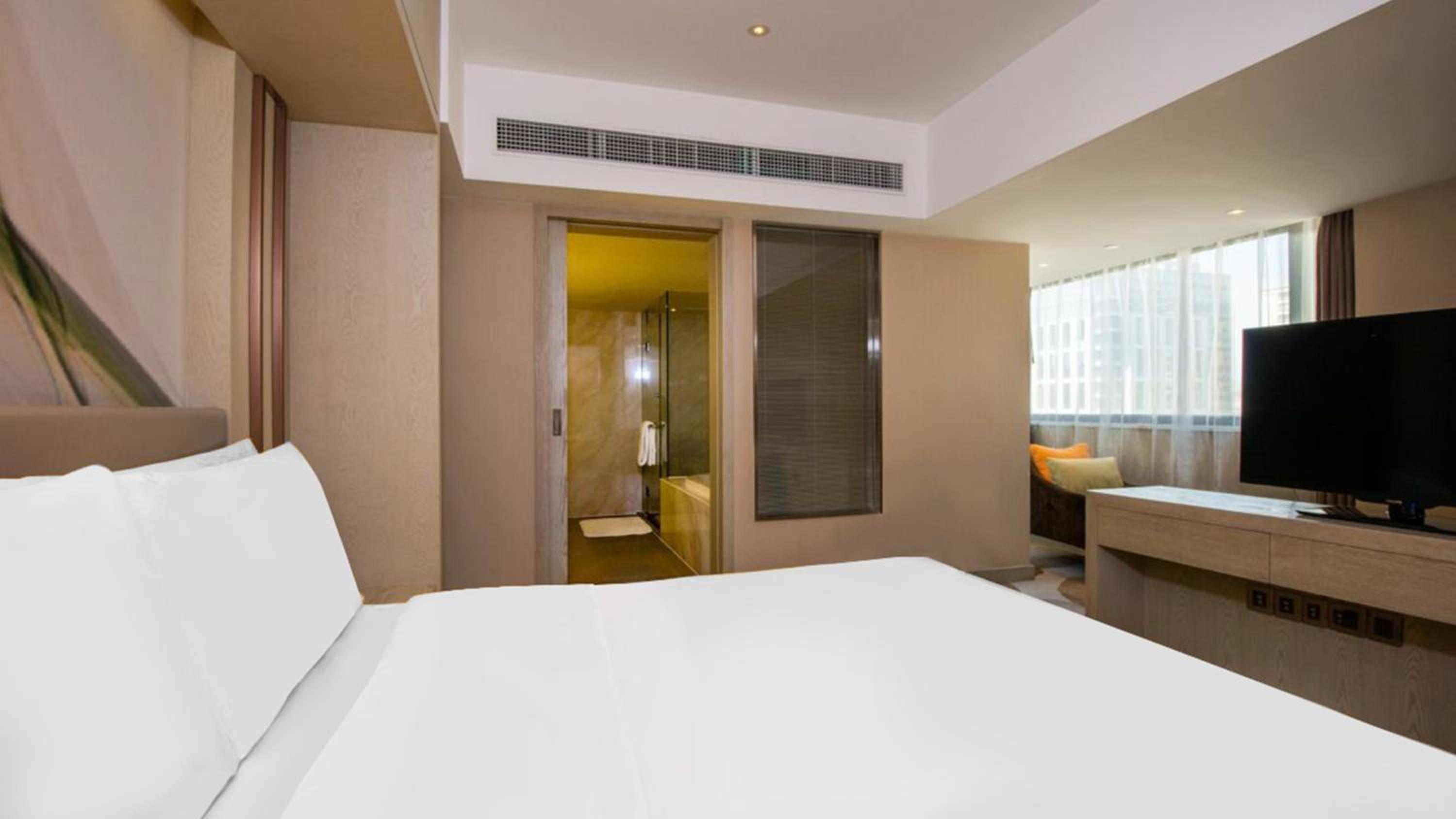 Premium King Room - Photo 2