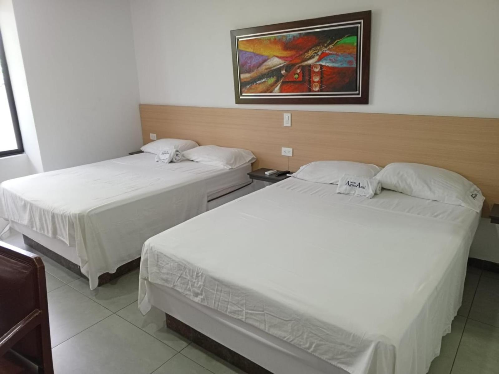 Deluxe Queen Room With Two Queen Beds photo 2