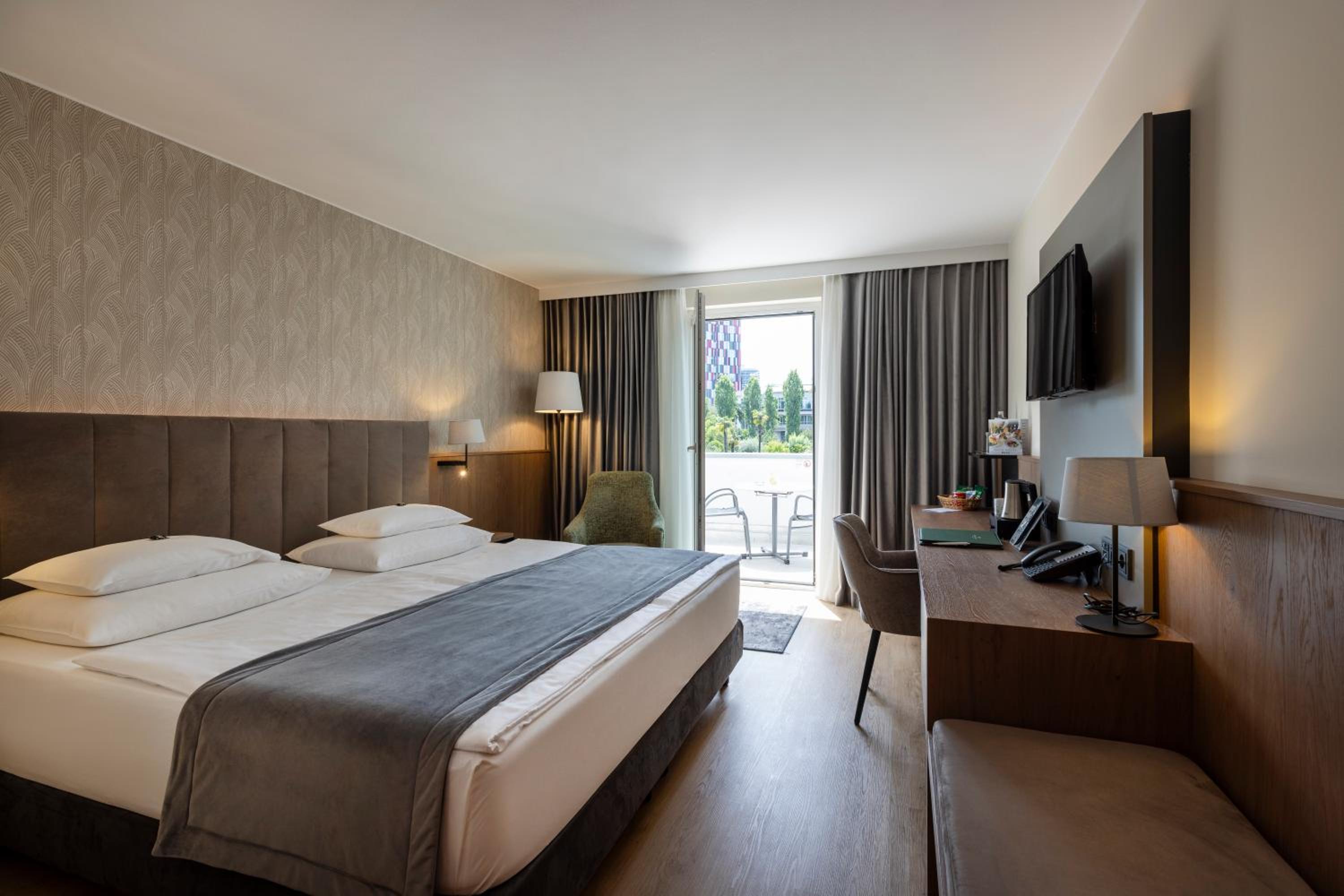 Deluxe Room with Garden View and Balcony