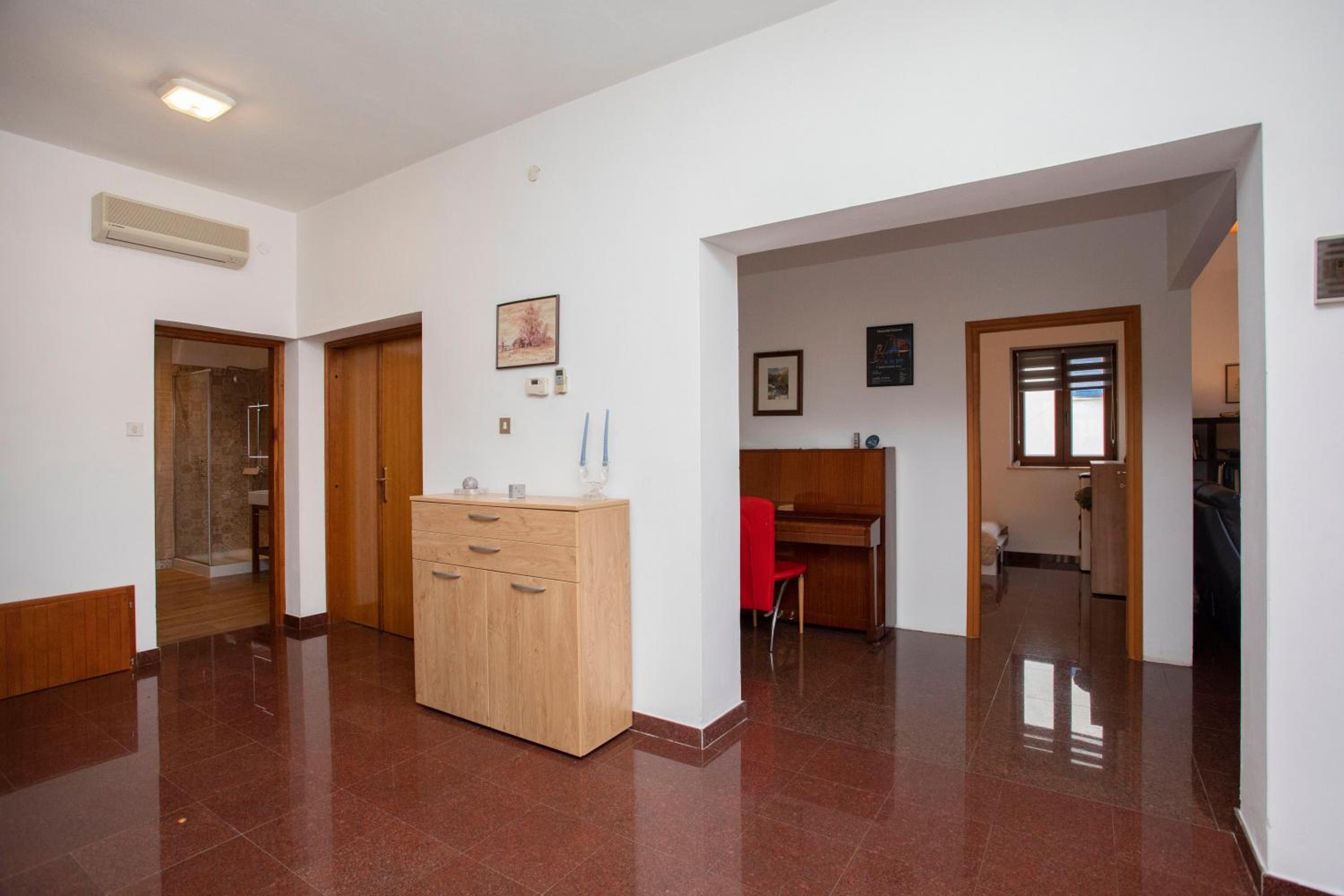 Three-Bedroom Apartment photo 1