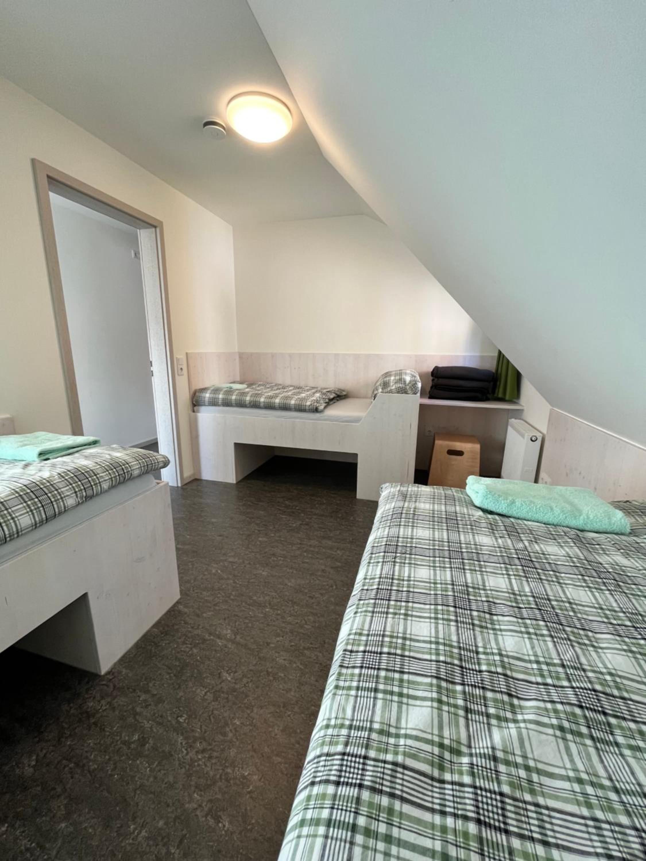 Basic Triple Room with Shared Bathroom photo 2