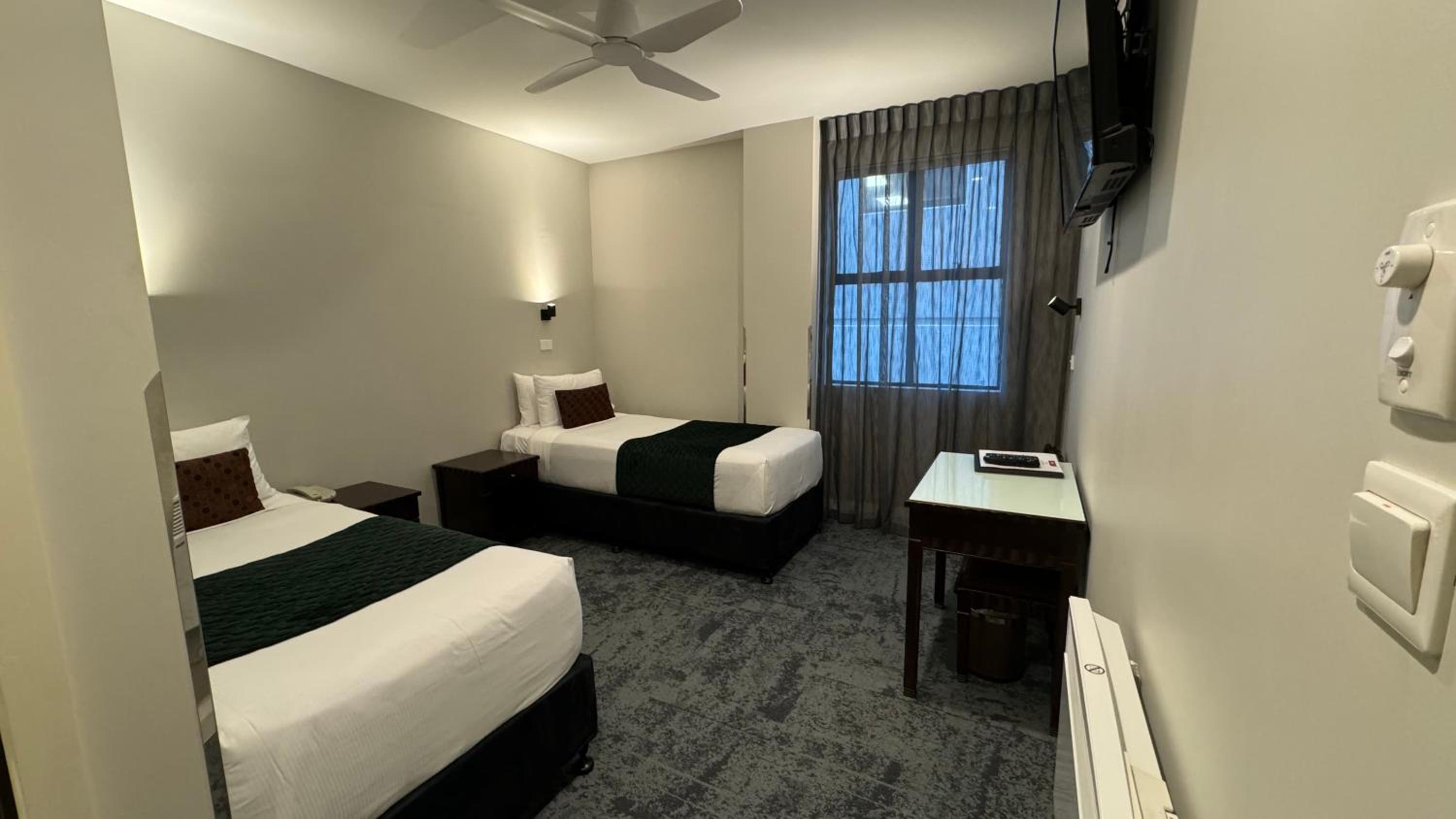 Twin Single Room - Photo 1