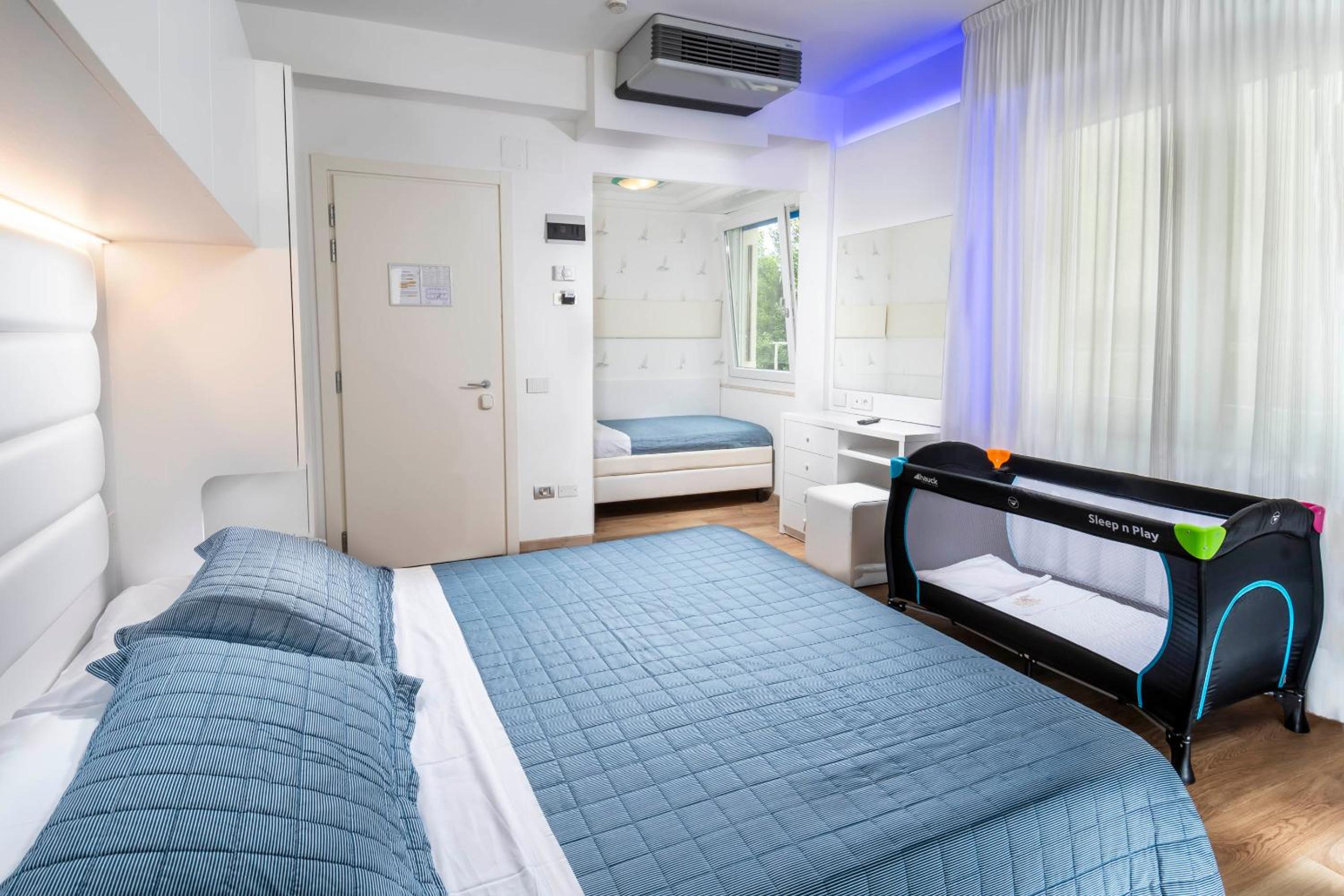 Quadruple Room with Balcony