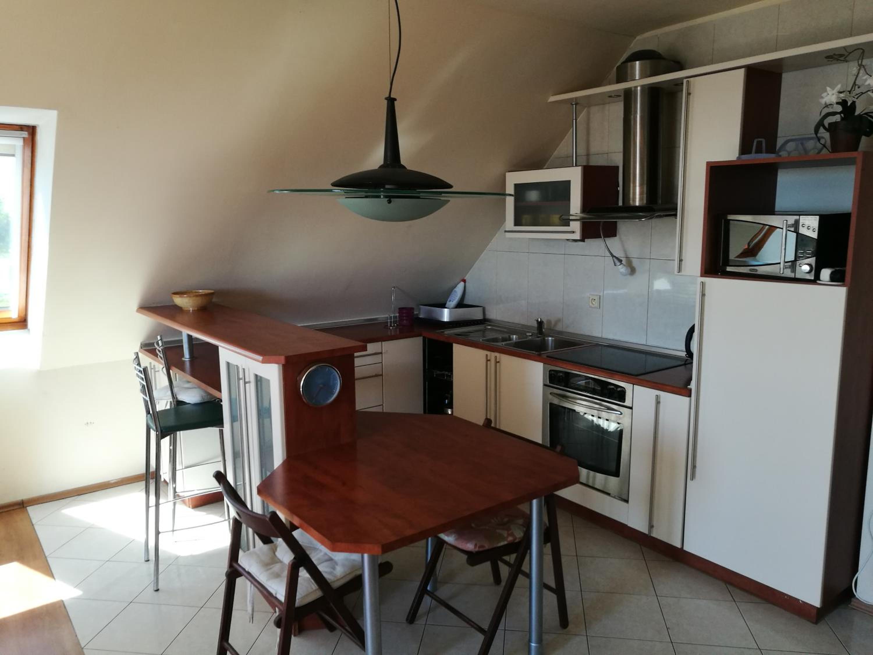 One-Bedroom Apartment with Balcony and Water View photo 2
