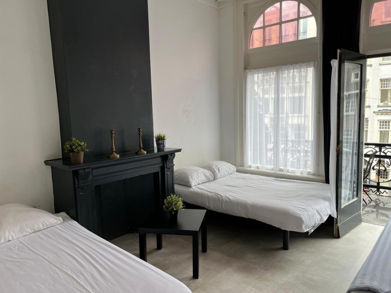 Quadruple Room with Balcony photo 2