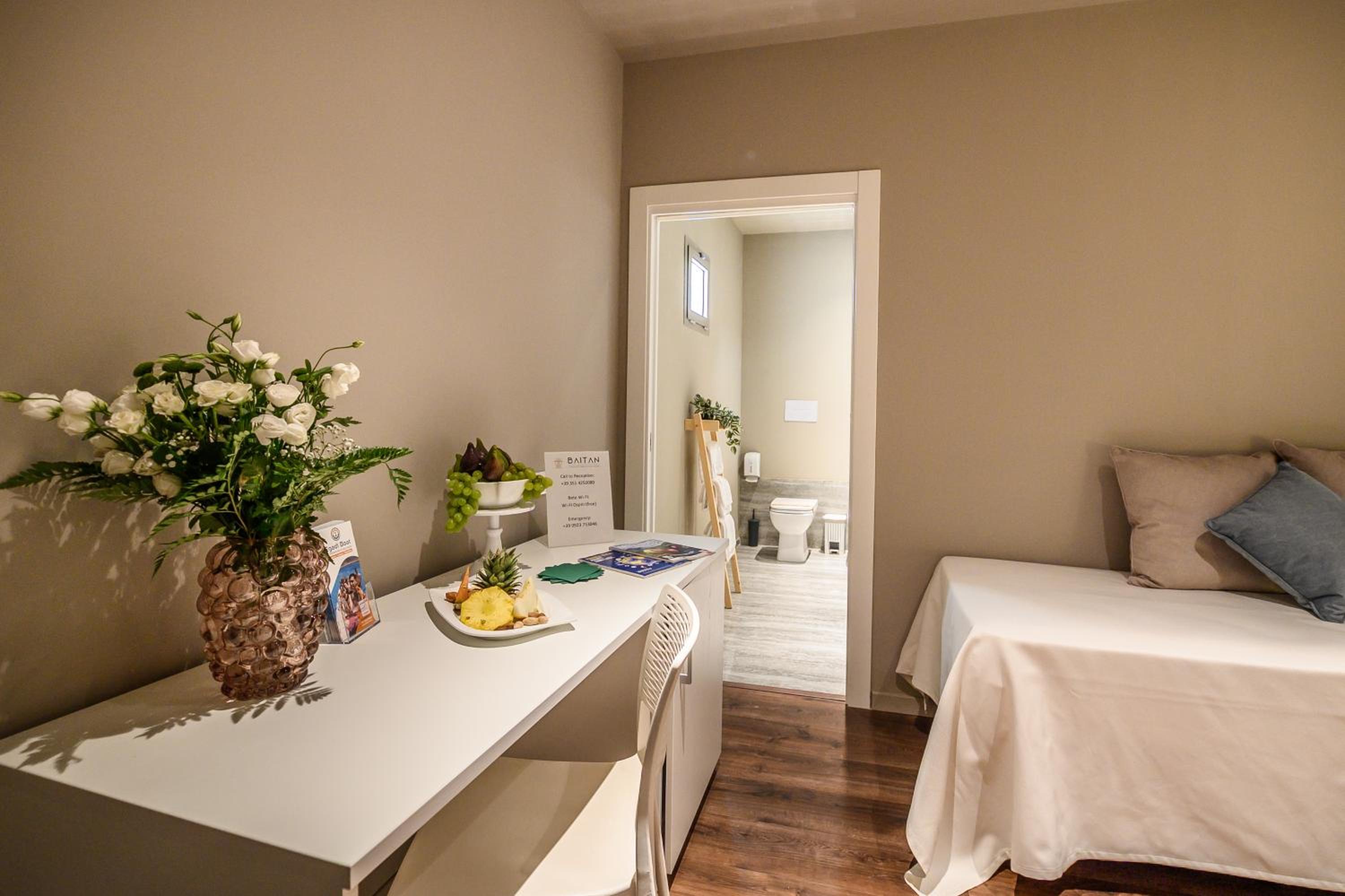 Deluxe Quadruple Room - Photo 7