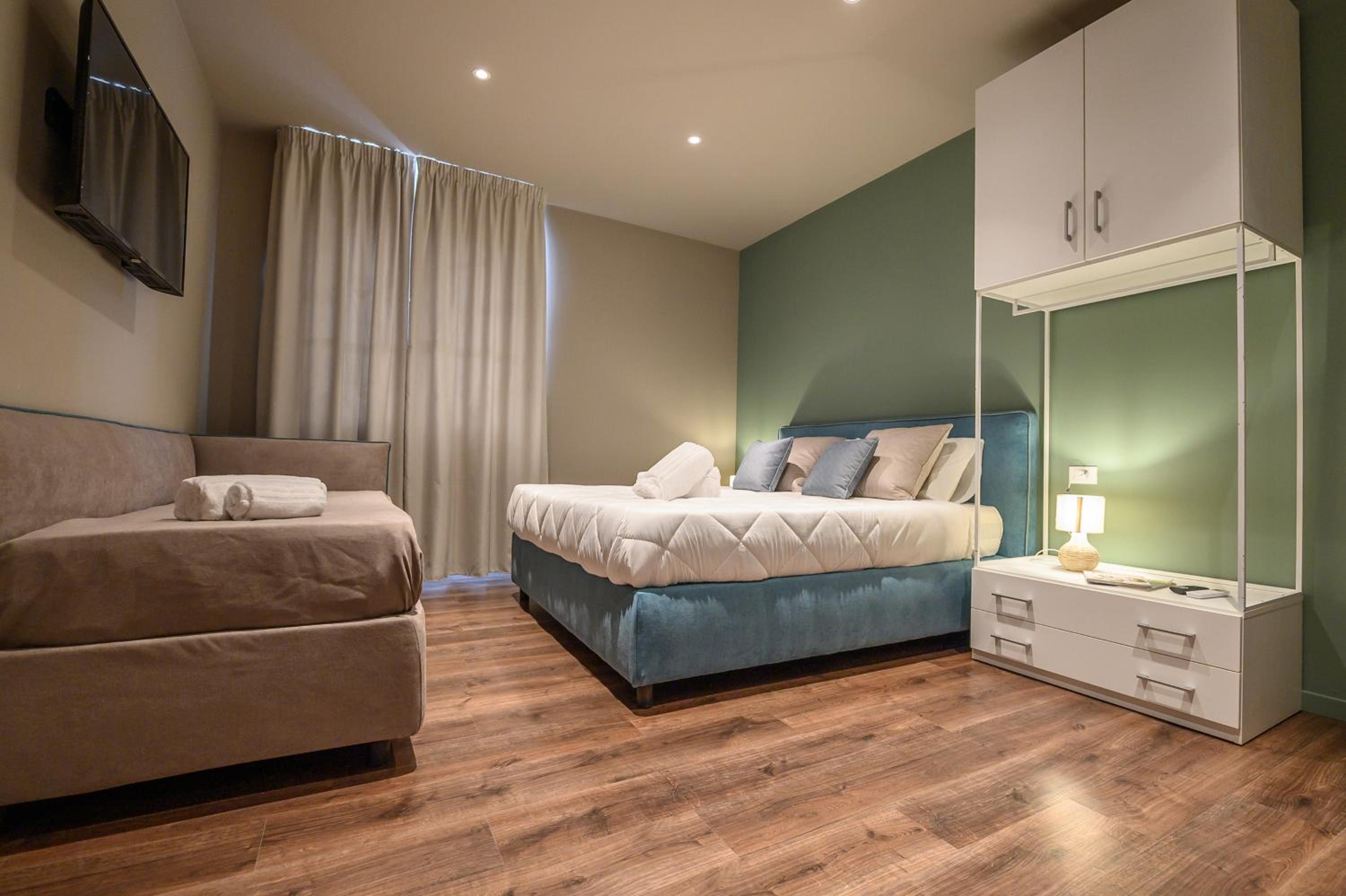 Deluxe Triple Room - Photo 1