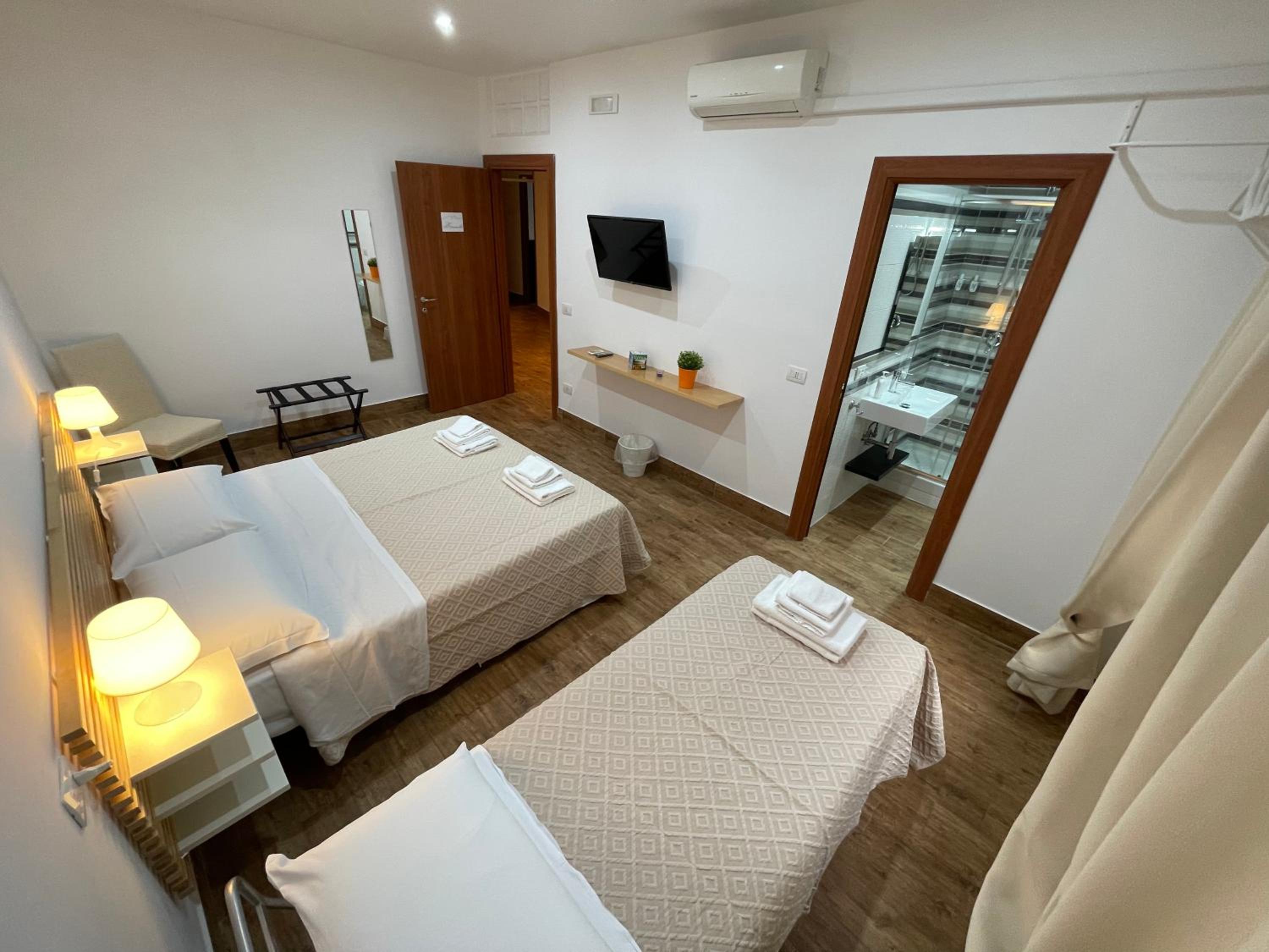 Four-Bedroom Apartment with Balcony 