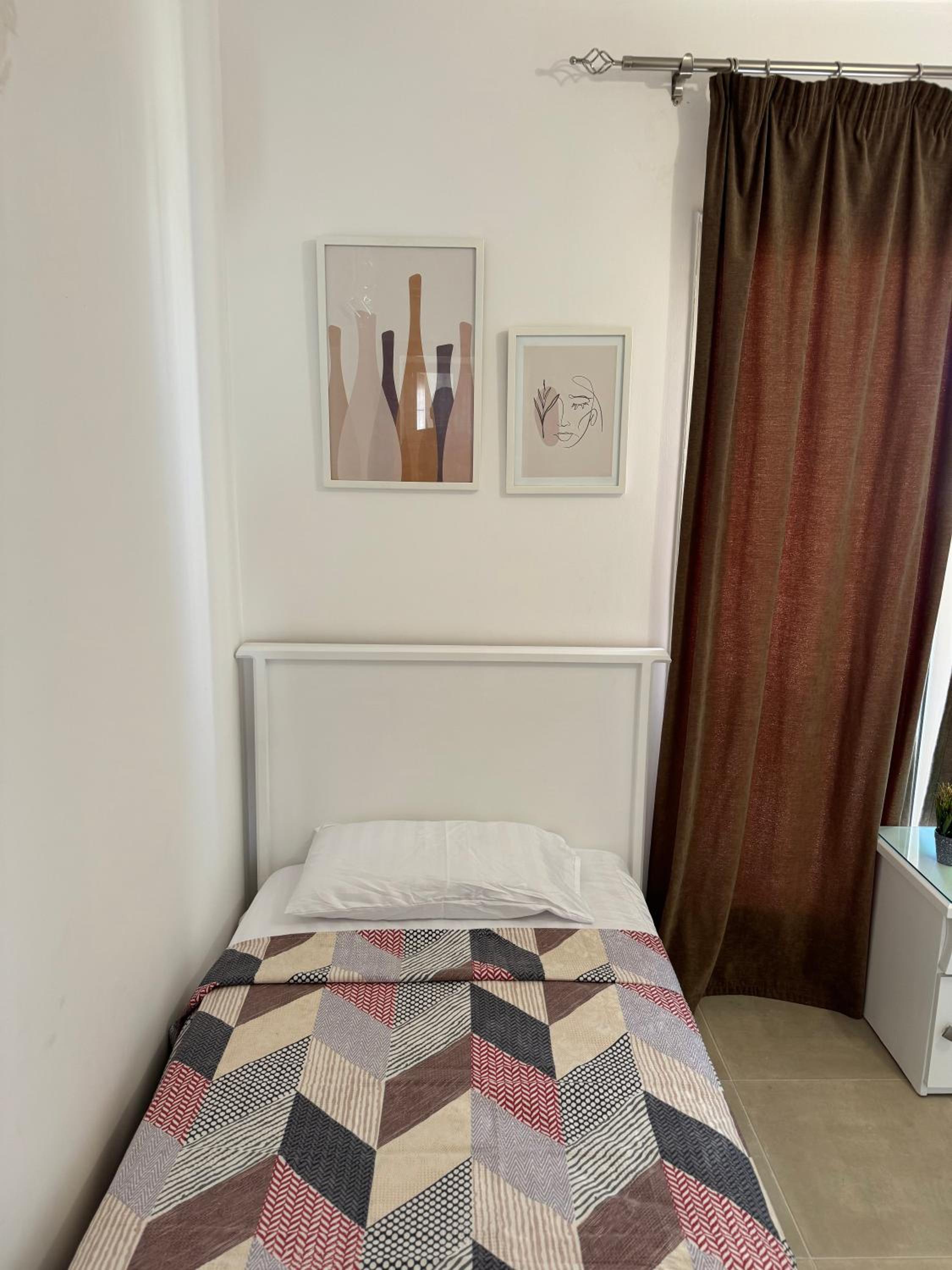 Three-Bedroom Apartment photo 3