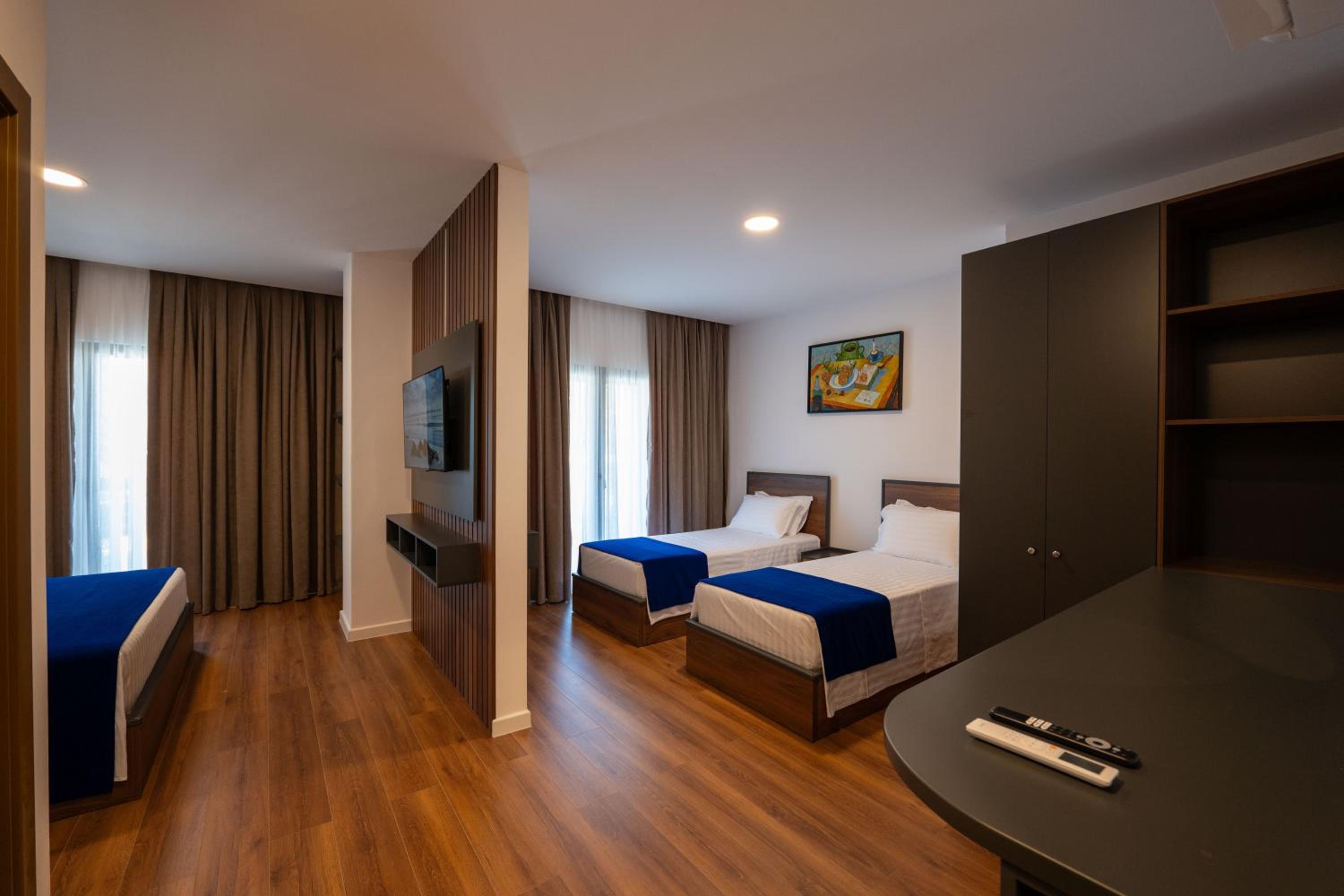 Deluxe Quadruple Room with Pool View
