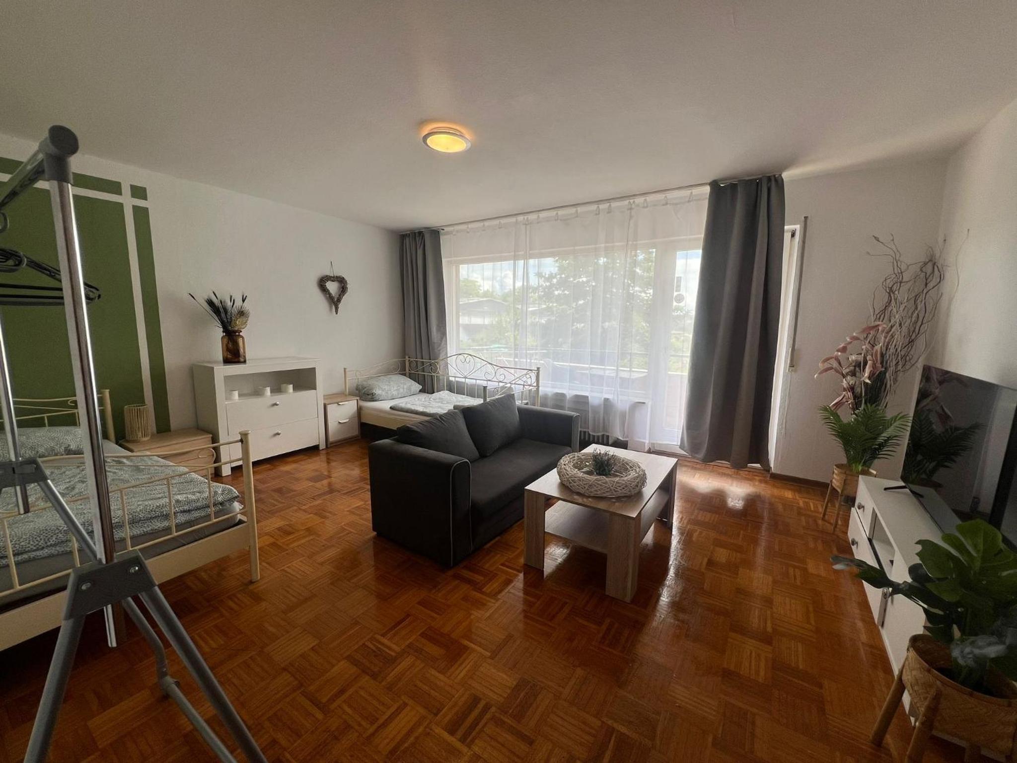 Three-Bedroom Apartment photo 1