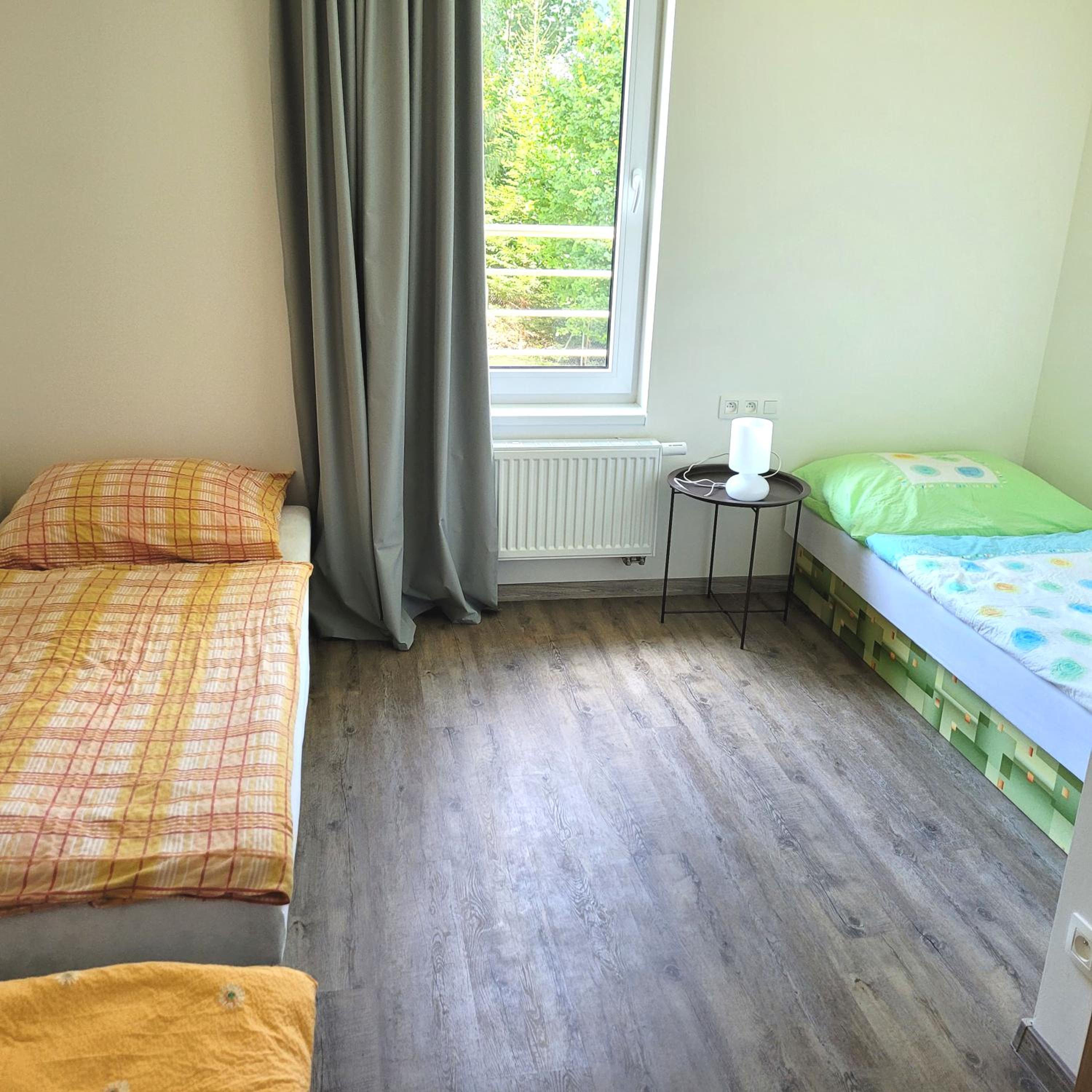 Three-Bedroom Apartment - Photo 10
