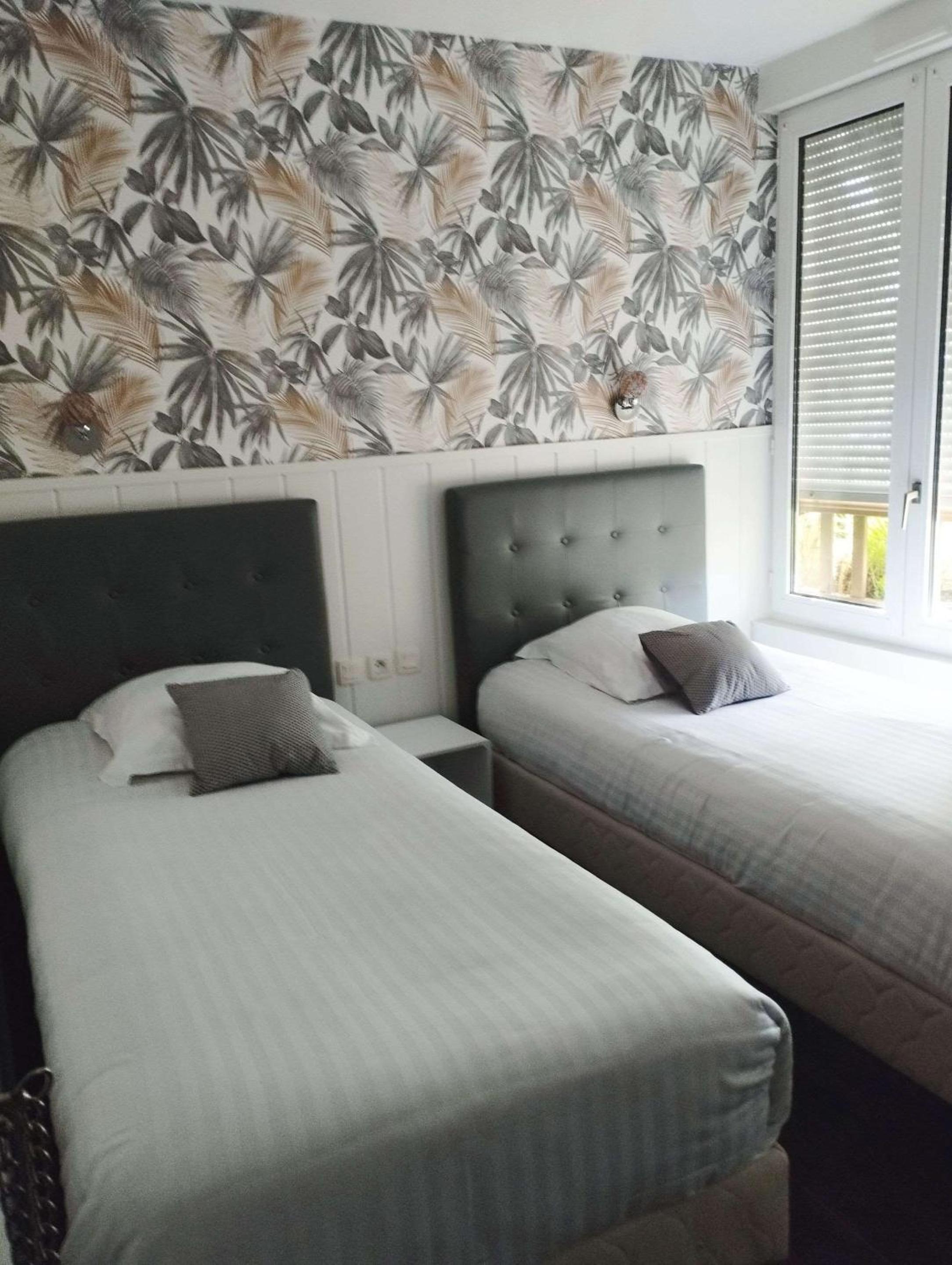 Twin Room - Photo 1
