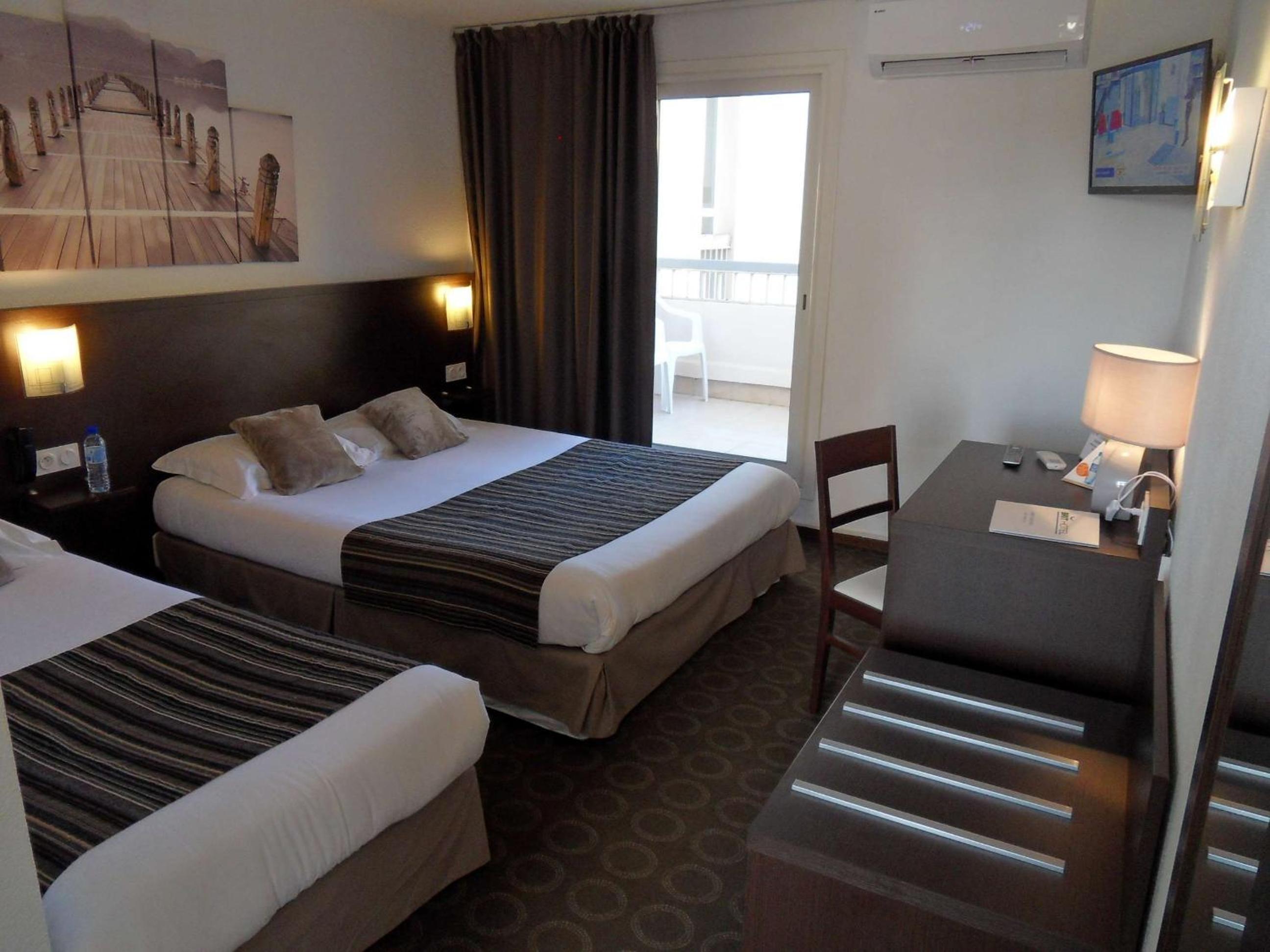 Triple Room (2 Adults + 1 Child)