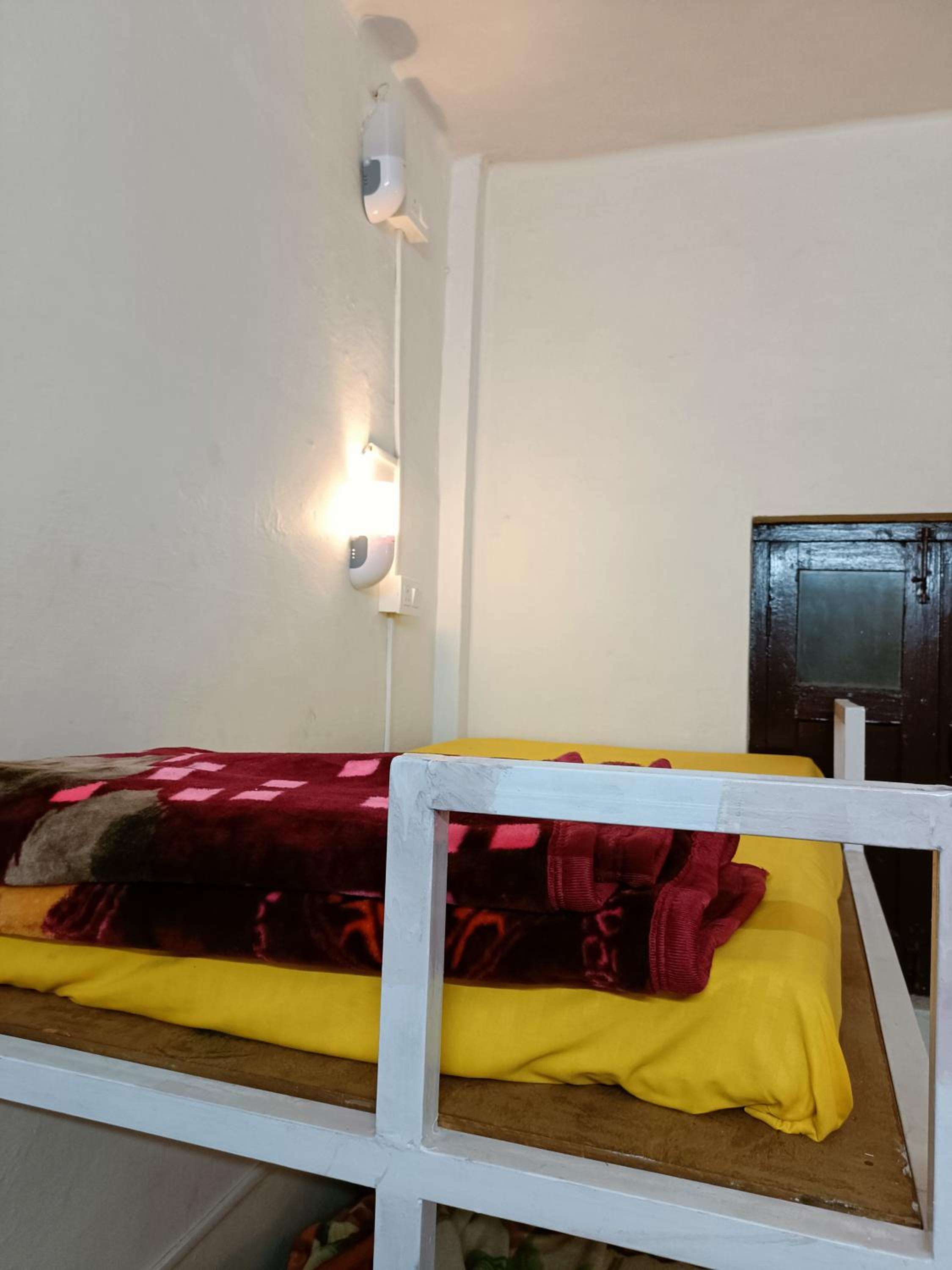 Single Bed In Dormitory Room photo 1