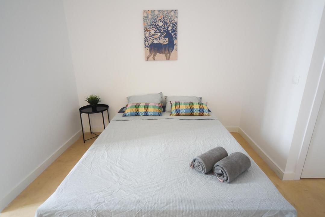 Habitación Triple con Baño Compartido