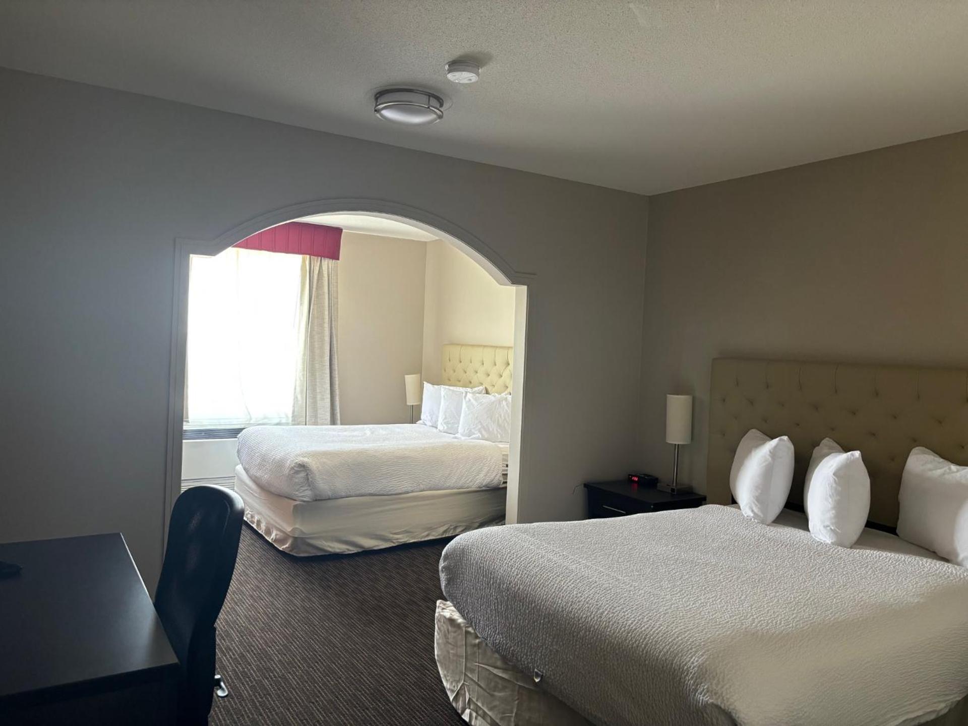 Queen Room with Two Queen Beds - Photo 1