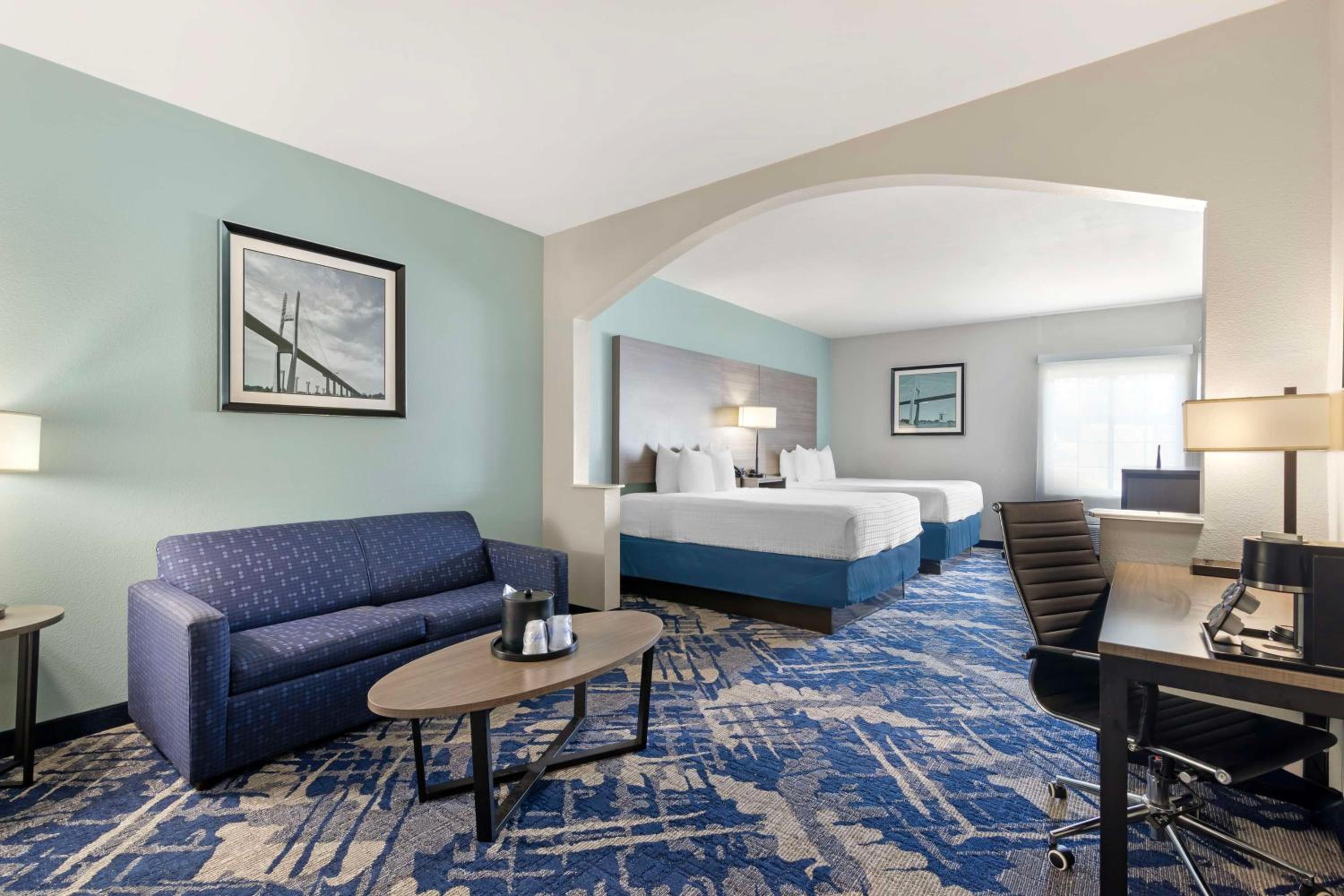 Queen Suite with Two Queen Beds and Sofa Bed - Photo 1