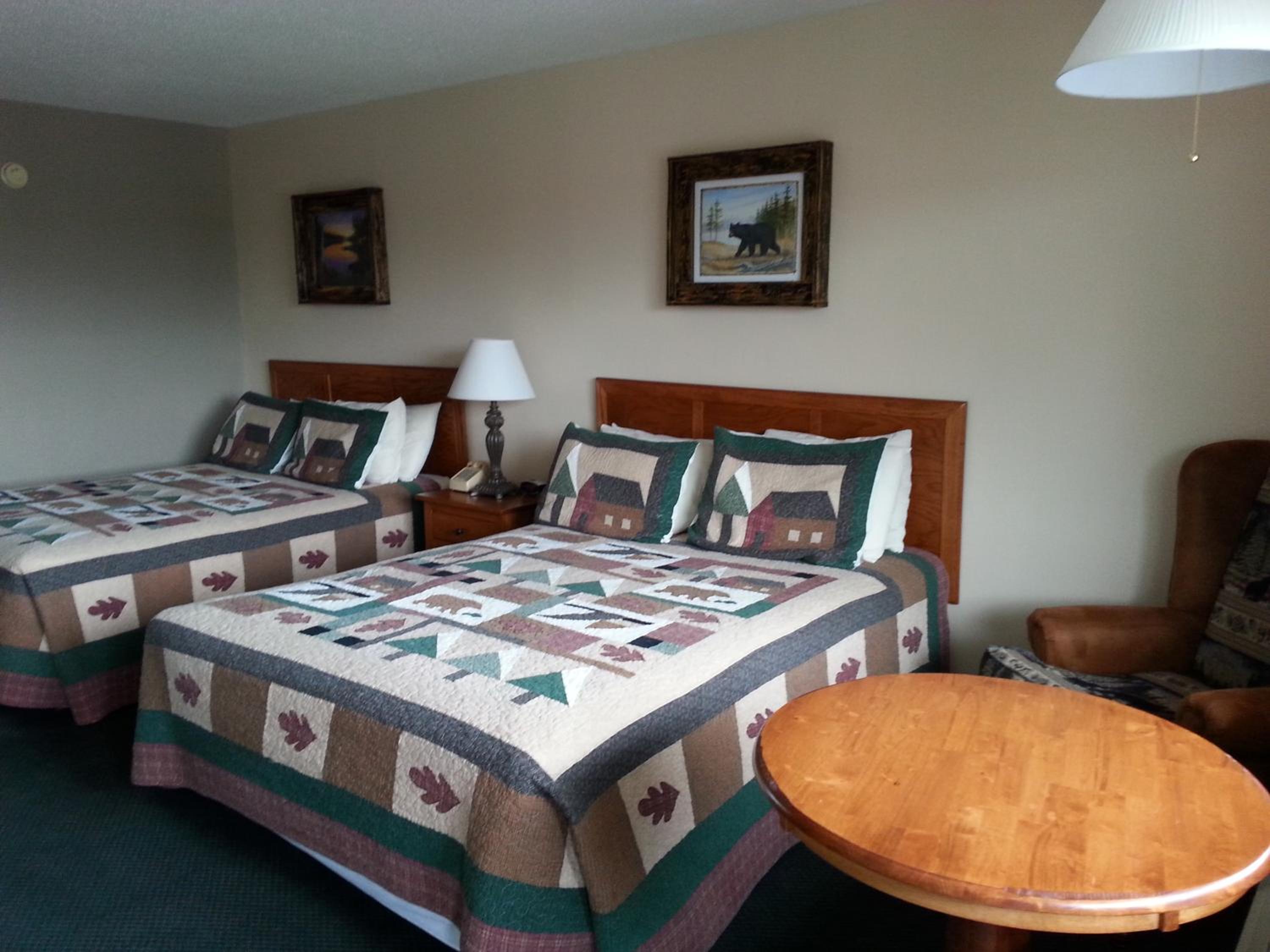 Queen Room with Two Queen Beds - Smoking photo 1