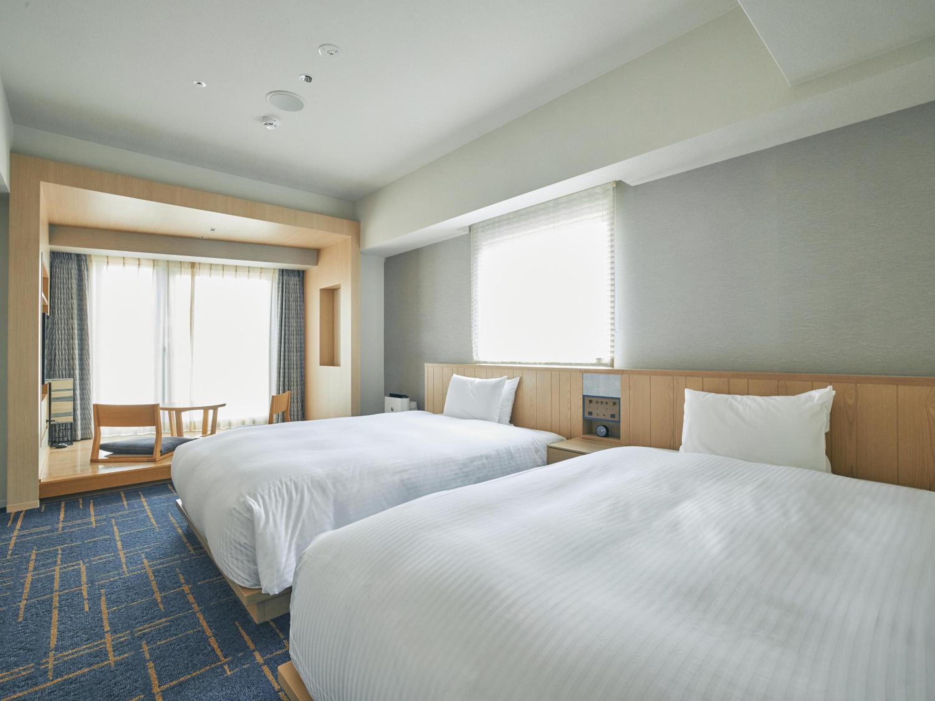 Twin Room with River View - Non-Smoking photo 1